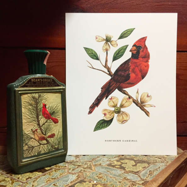 An original illustration of a cardinal perched on a dogwood branch.