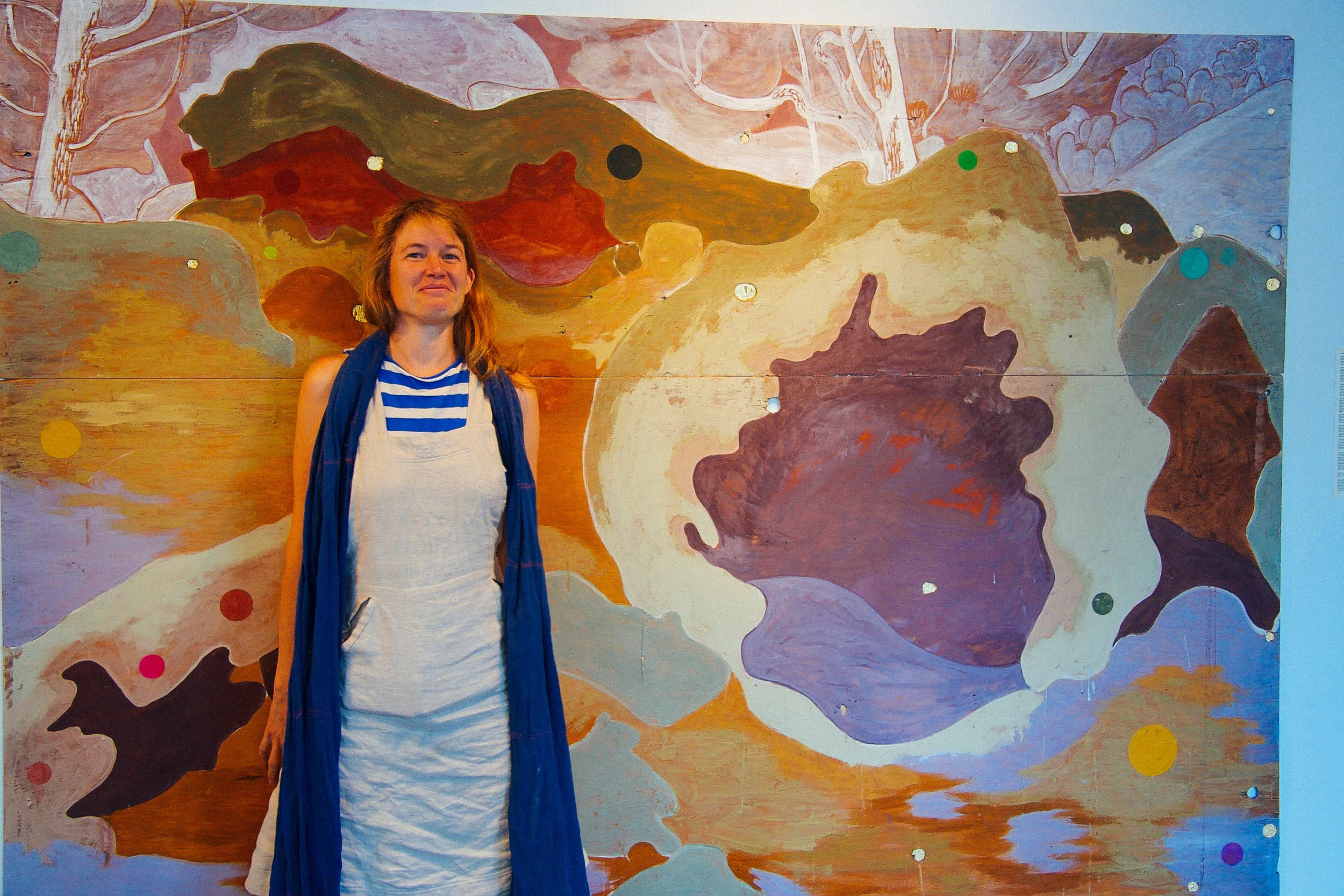 Tilke and her full sized initial Animal Village painting, as mentioned in our conversation on the Ground Shots Podcast.