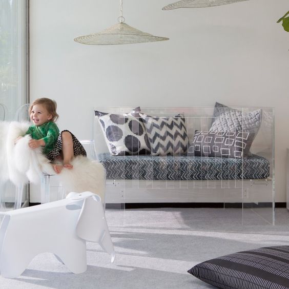 This is the ultimate beauty of acrylic furniture; it allows you to get expressive with your choice of soft furnishings.