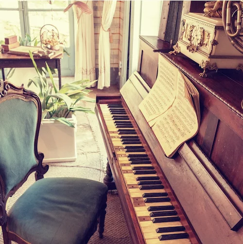 Canva - Brown Wooden Upright Piano.jpg