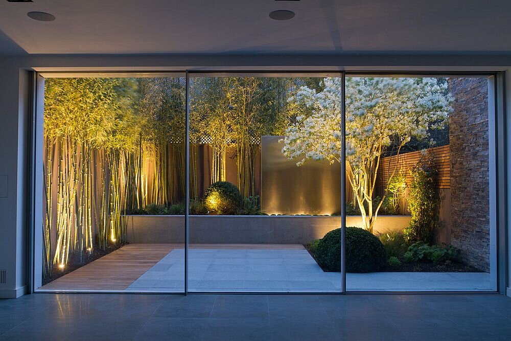 Bamboo-white-flowers-and-a-water-feature-turn-this-small-garden-into-a-showstopper.jpg