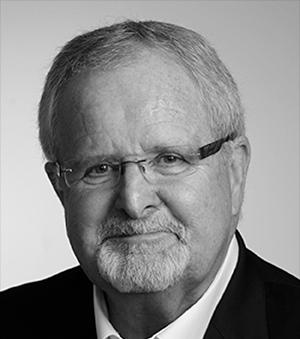 Larry Nelson was born and bred in Moncton. Upon graduating high school he took a job at Lounsbury, and he has continued with the company for 45 years. Since taking the helm as President and CEO in 1994, Larry has grown and diversified the company, leading it successfully through some challenging times. The Lounsbury Group now comprises 17 companies, employing 400 New Brunswicker. A member of the Order of Canada, Larry is dedicated to the community, chairing and volunteering on a wide variety of boards. Larry Nelson est né et a grandi à Moncton. Après avoir reçu son diplôme d’études secondaires, il entre à l’entreprise Lounsbury et il y travaille toujours 45 ans plus tard. Depuis qu’il a accédé au poste de président et chef de la direction en 1994, Larry a fait croître et diversifier l’entreprise, gérant la société avec succès dans des moments difficiles. Le Groupe Lounsbury comprend maintenant 17 entreprises et emploie 400 Néo-Brunswickois. Membre de l’Ordre du Canada, Larry se dévoue à sa communauté, servant comme président et bénévole auprès de nombreux conseils d’administration.
