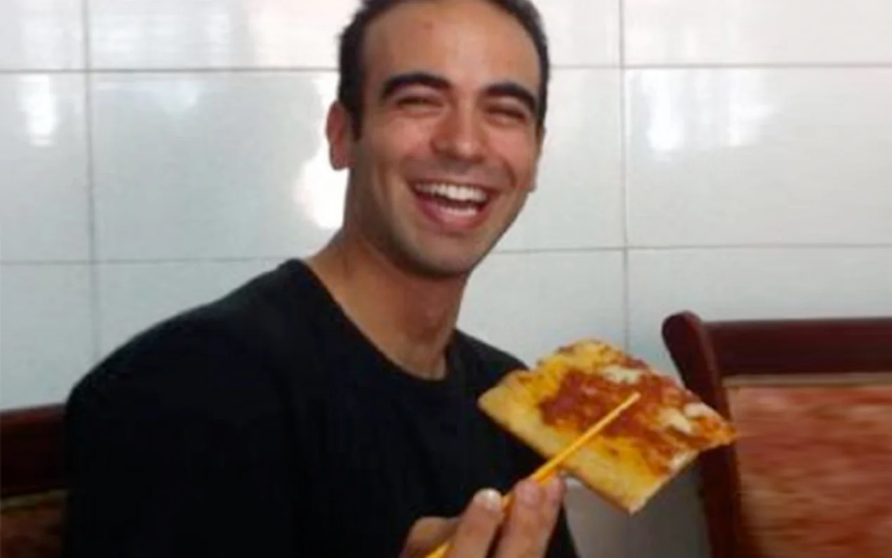 Alberto Maio eating pizza in China