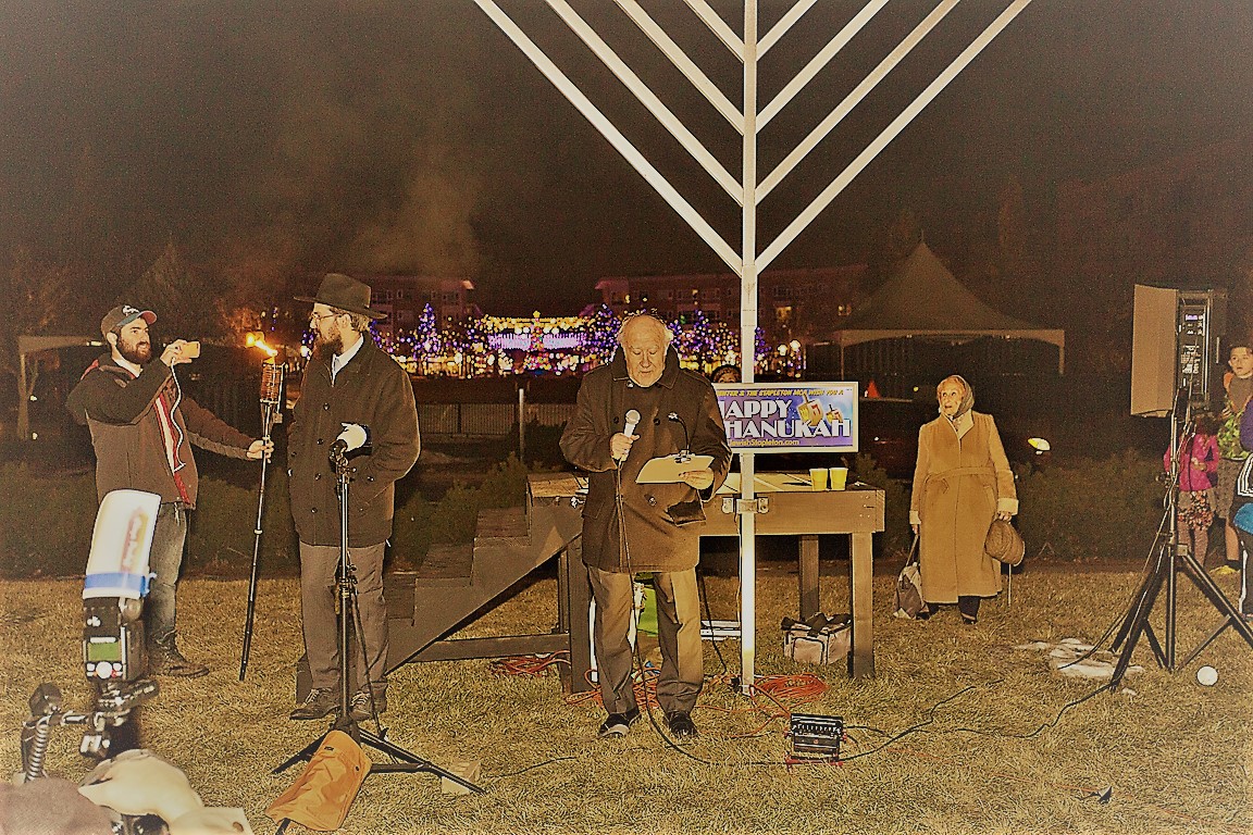 Cantor Kutner singing the Hanukkah Blessing
