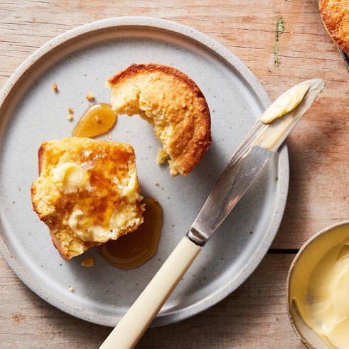 I say, corn muffins are the BEST muffins. What do YOU say?! Recipe for rich and buttery corn muffins online @nytcooking, link in bio. 📸: @christophertestani food styling: @simoncooks 💕💛