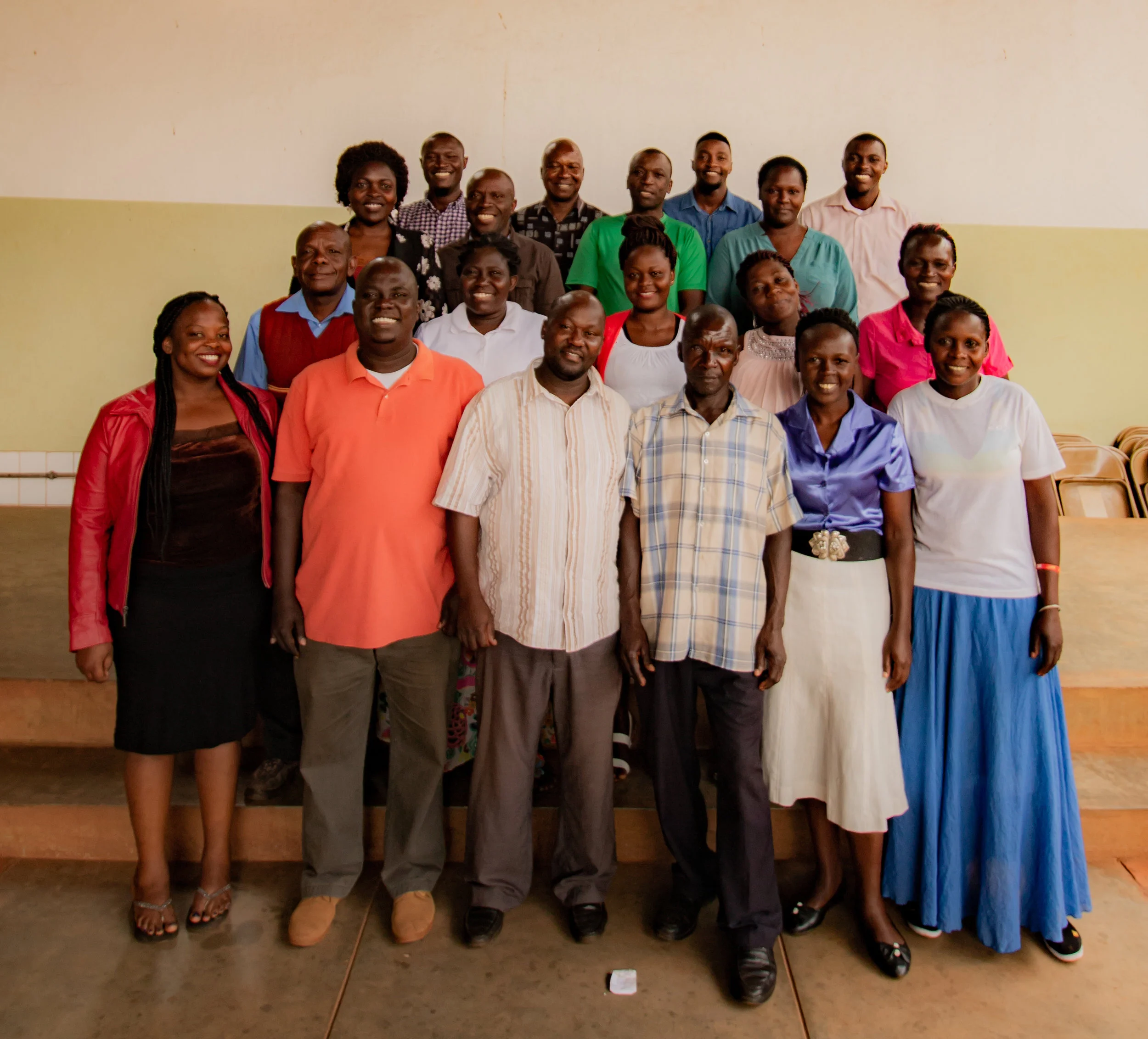 Top row: Tom Ngobi , Roy Mwesigwa , Enock Madoolo , and Alex Walyomu . Second row: Justine Nandera , Steven Kambale , Abraham Mulongo , and Suzan Keddi . Third row: Alex Bamulumbye , Ida Bazonona , Sarah Naguti , Manuela Ongyera , and Jeska Nairuba . Bottom row: Lorna Katagara , Henry Oyier , David Balimunsi , Martin Kibuuka , Harriet Kefeza , and Tape Bwana . Not pictured: Irene Ngobi .
