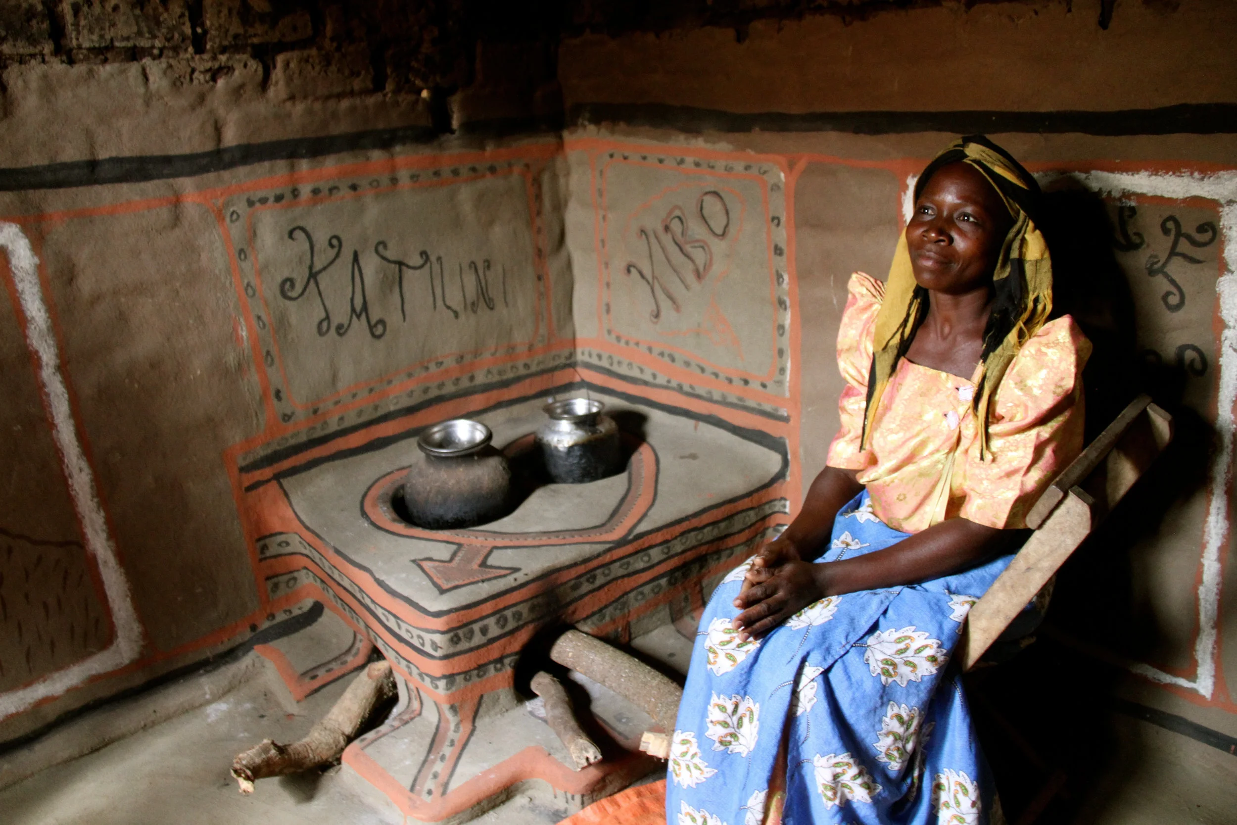 This woman is proud of her stove! She went above and beyond to decorate it. We love seeing that kind of ownership in the stove program!