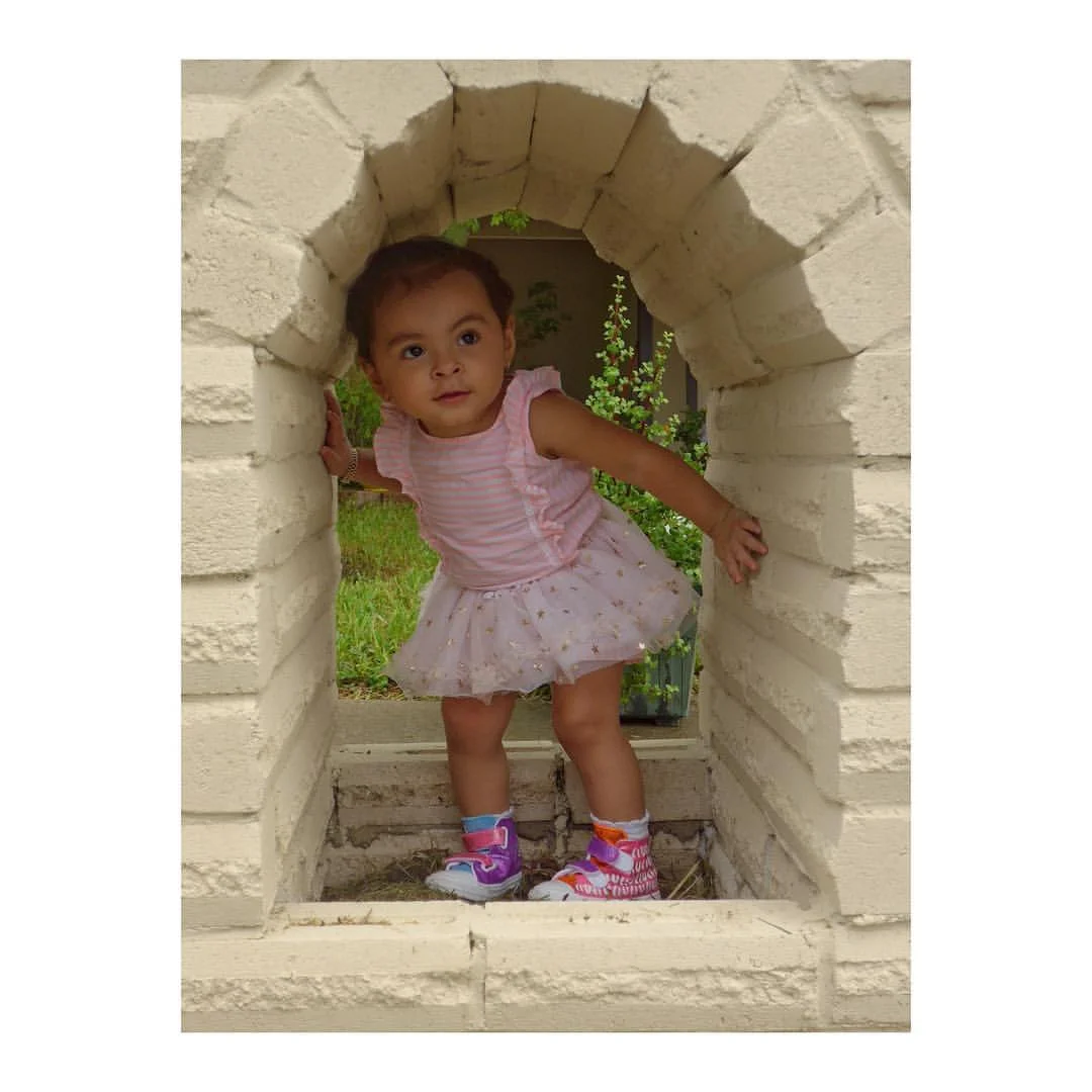 Ava kicks it.jpg