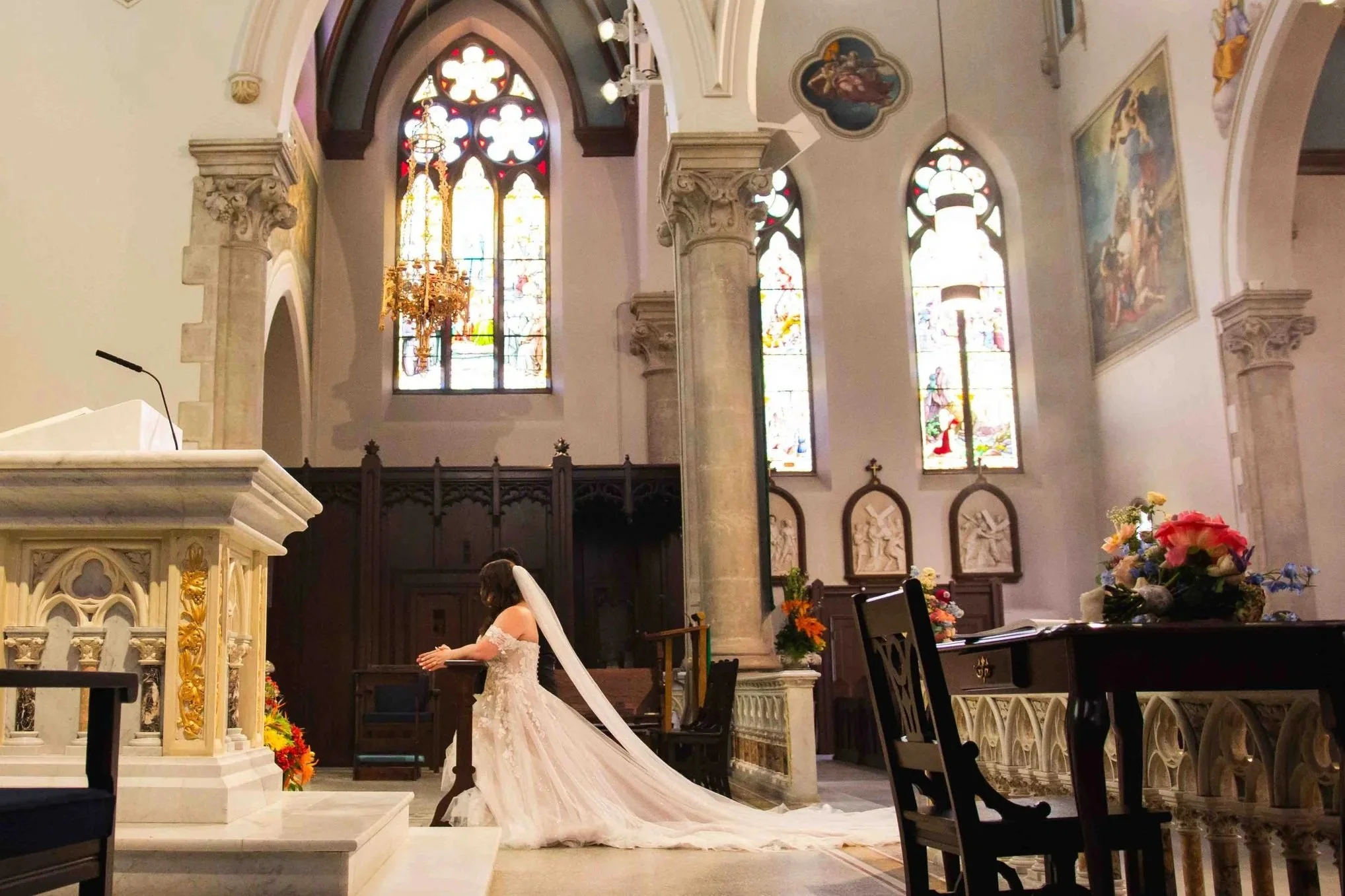 Wedding photo of the bride inside the basilica of our lady immaculate in Guelph Ontario.