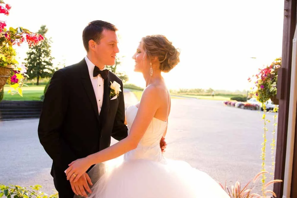 Golden hour wedding photos of bride and groom during golden hour at a golf course in Toronto.