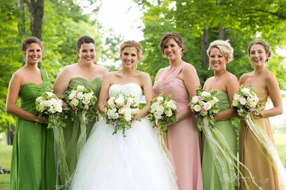 Photo of the the bride and bridesmaids on her wedding day at Blue Springs golf club in Ontario.