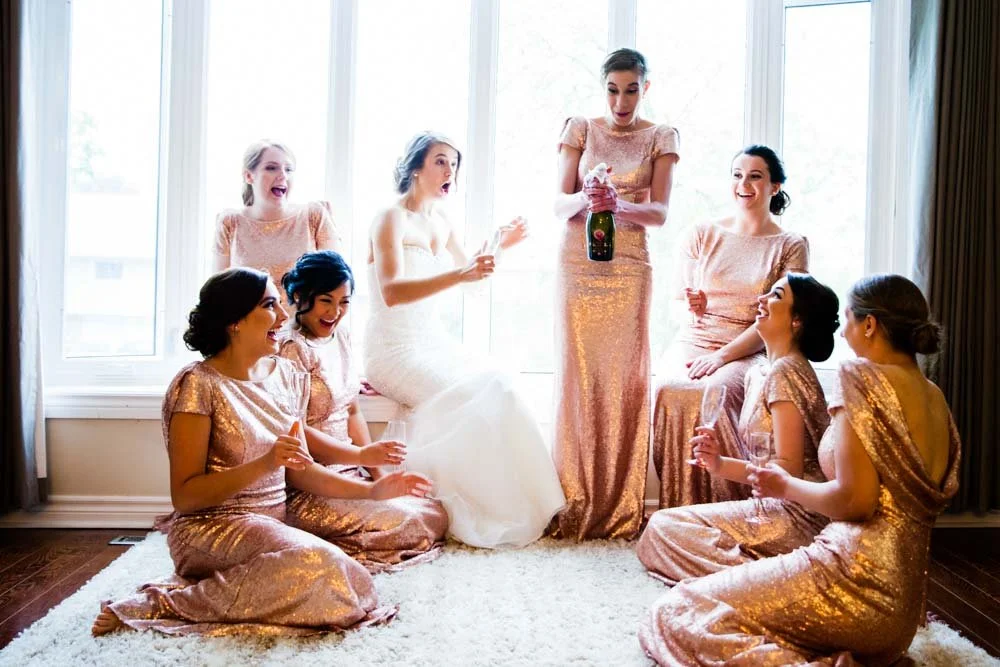 Bride getting ready moments with bridesmaids in Toronto Ontario.
