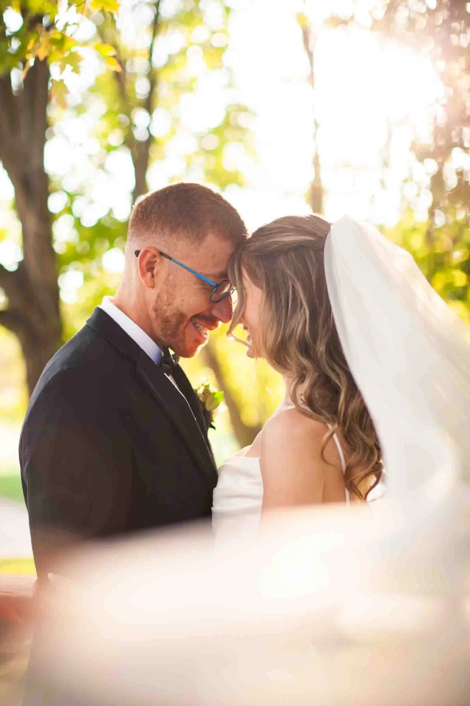 Golden Hour Wedding Photos at Muskoka Bay Resort with Flowing Veil