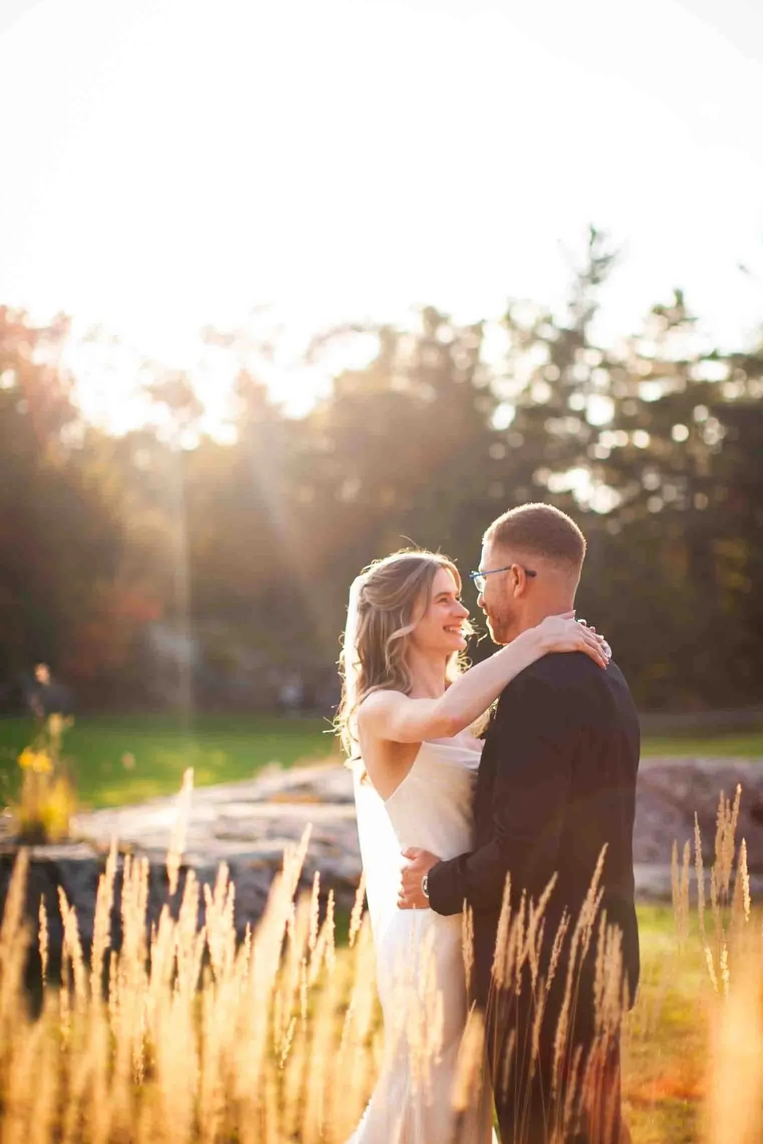 Muskoka Bay Resort Wedding Photography – Golden Hour Portrait with Flowing Veil