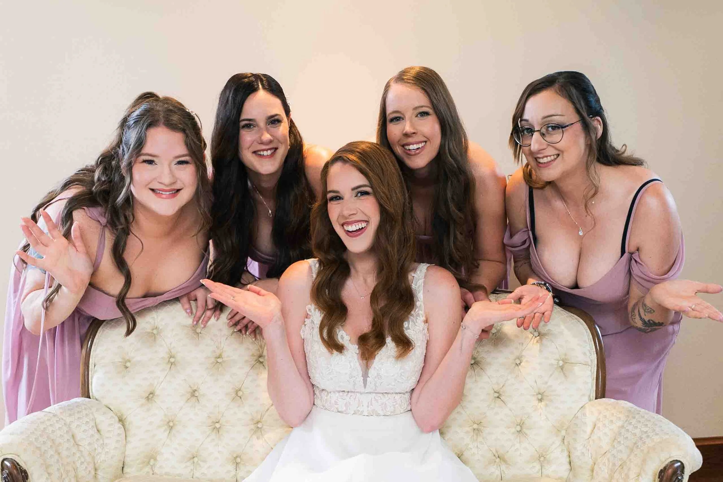 Bride with bridesmaids at Hauser Hall