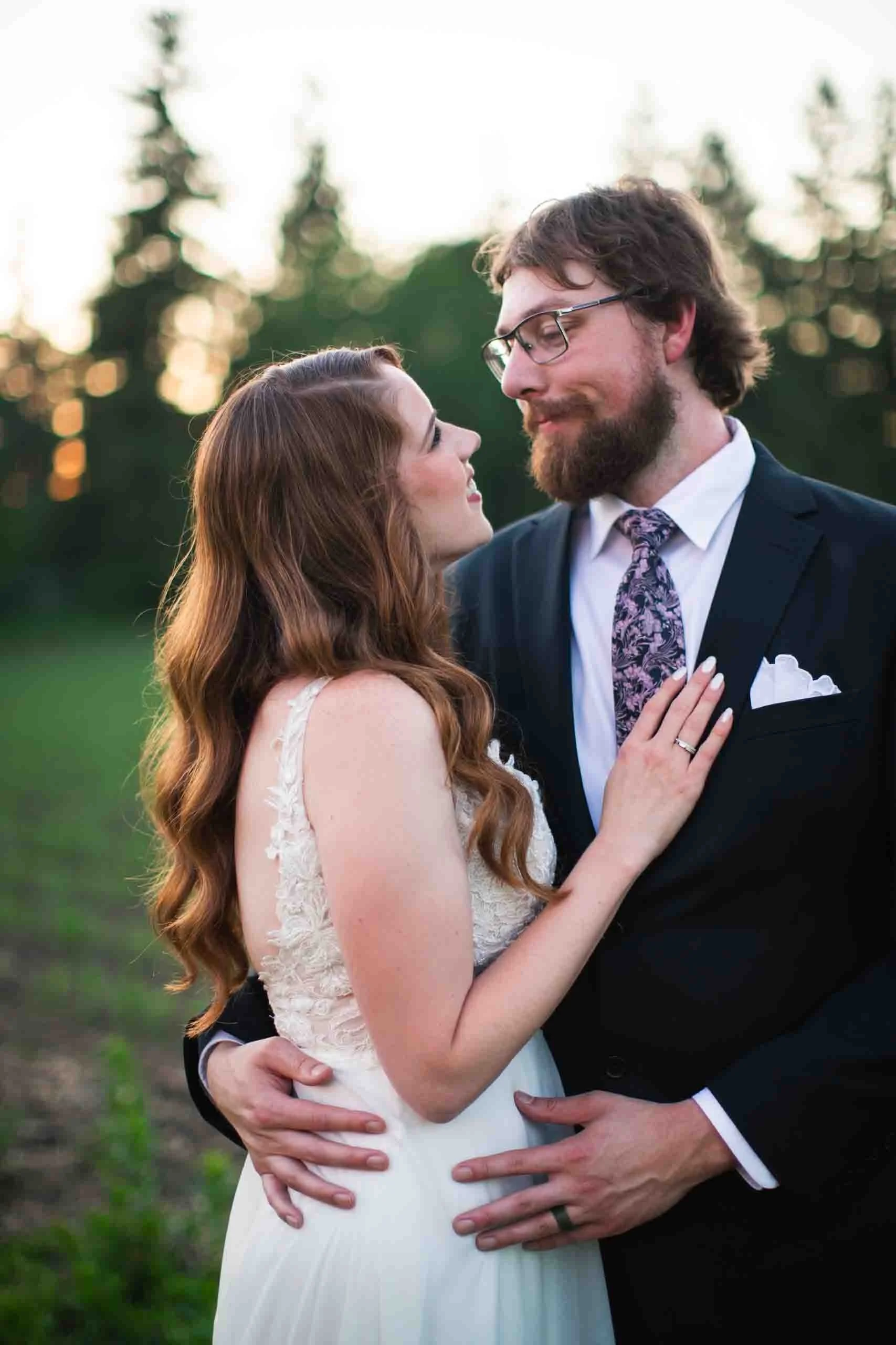 Bride and groom sunset portraits