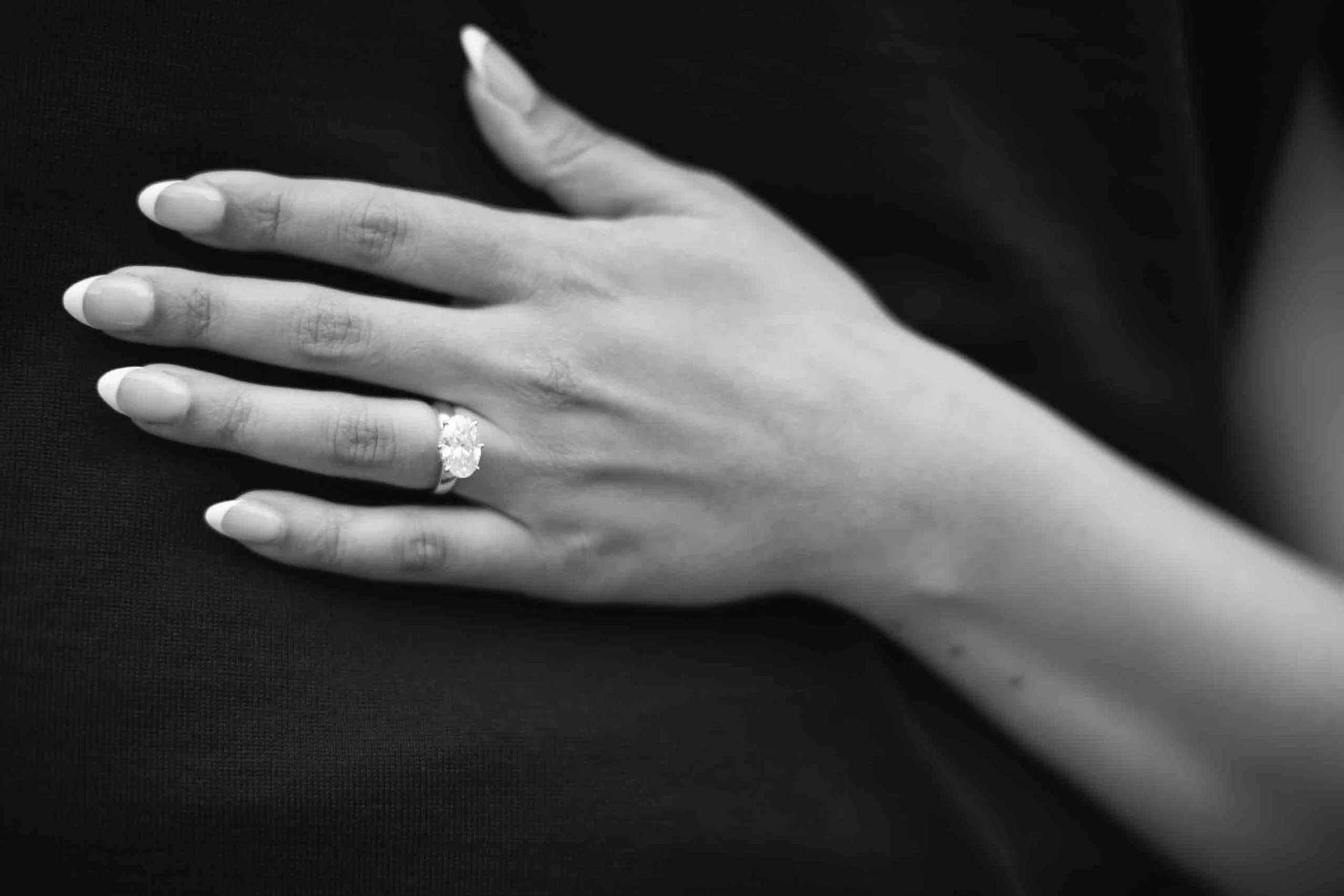 detailed shot of the engagement ring during a surprise proposal engagement photoshoot on a rooftop in downtown toronto.