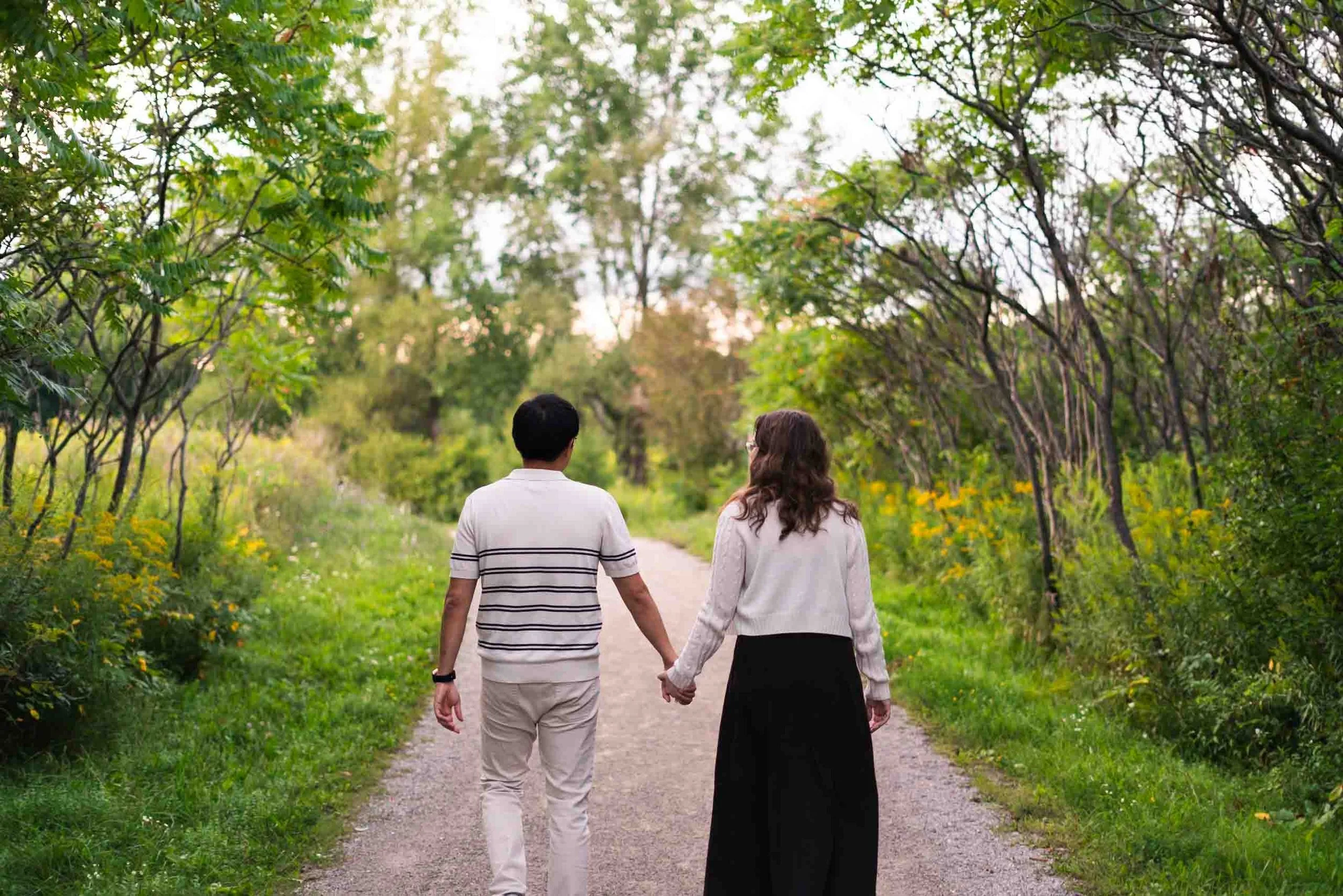 Engagement photoshoot at a trail at Huron Natural Area in Kitchener Ontario.