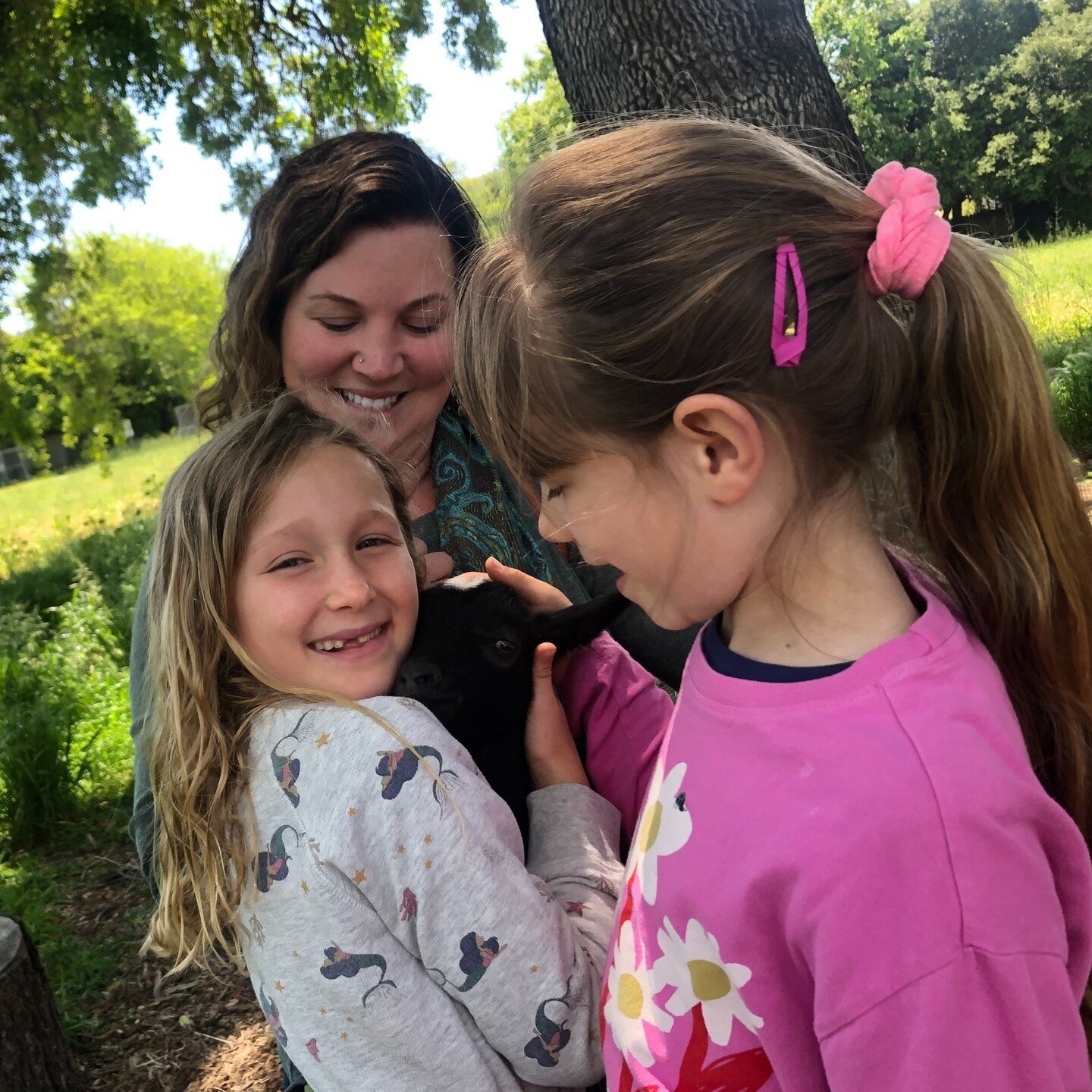 Some adorable kids visiting some adorable kids! One 1st grade family brought their goats to school.