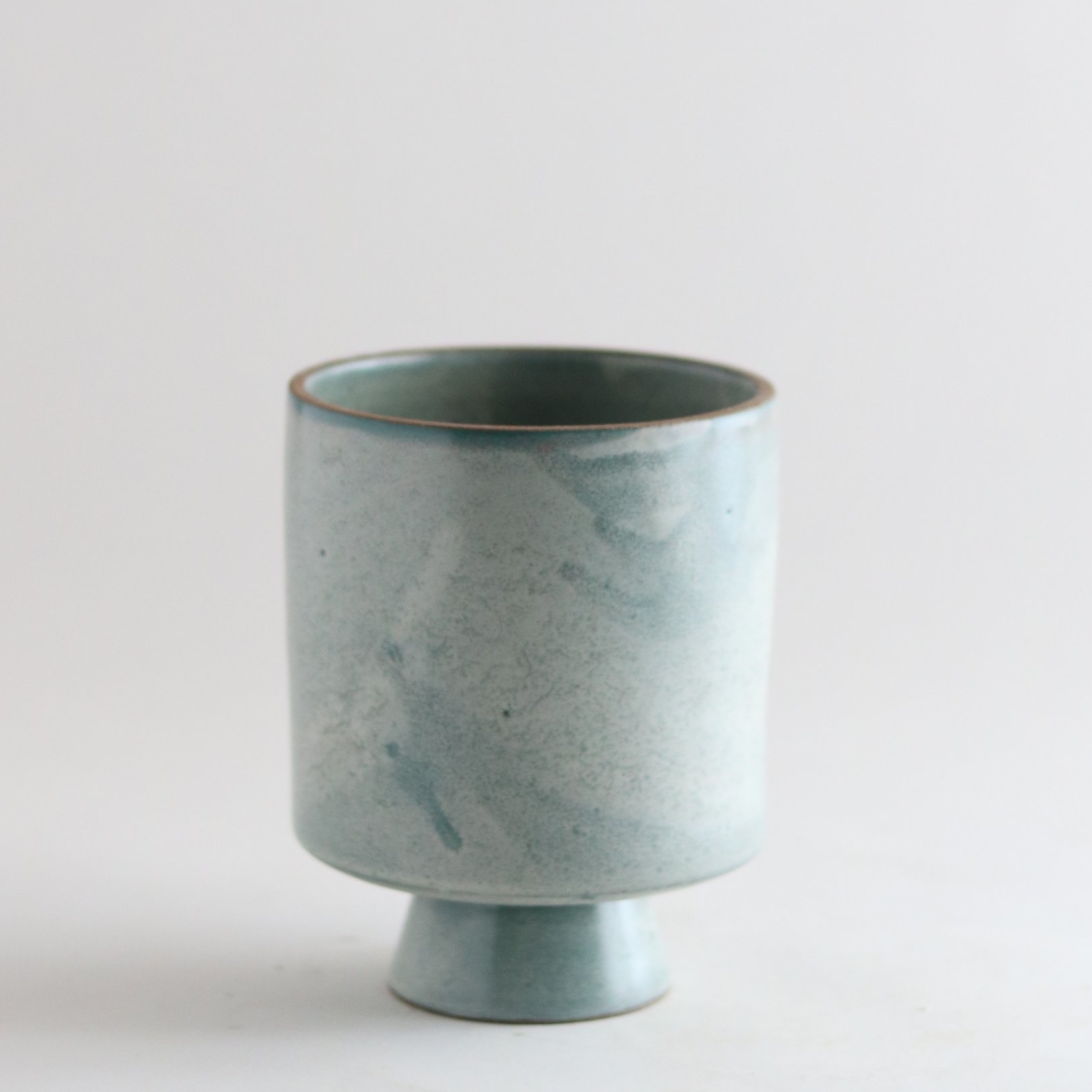 Raised cylinder vase