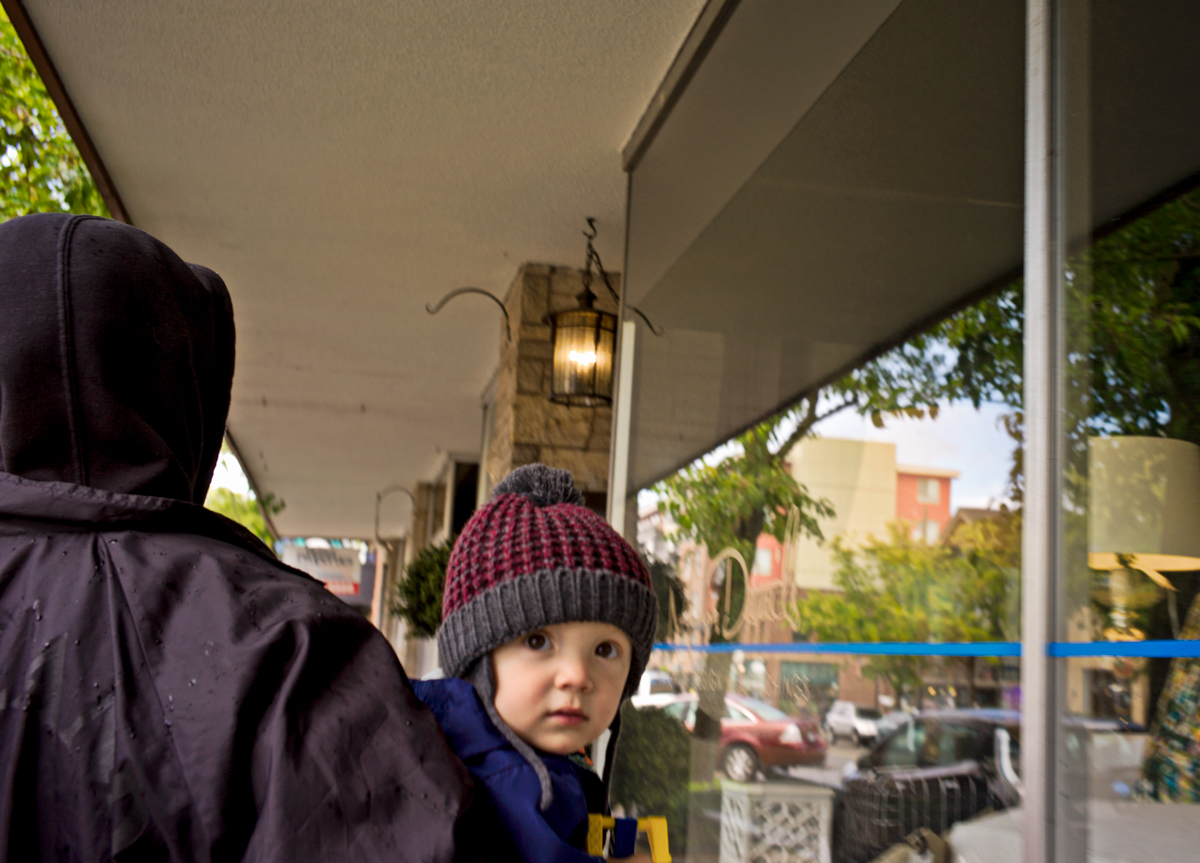 Small Boy In Dad's Arms In The Rain 2018