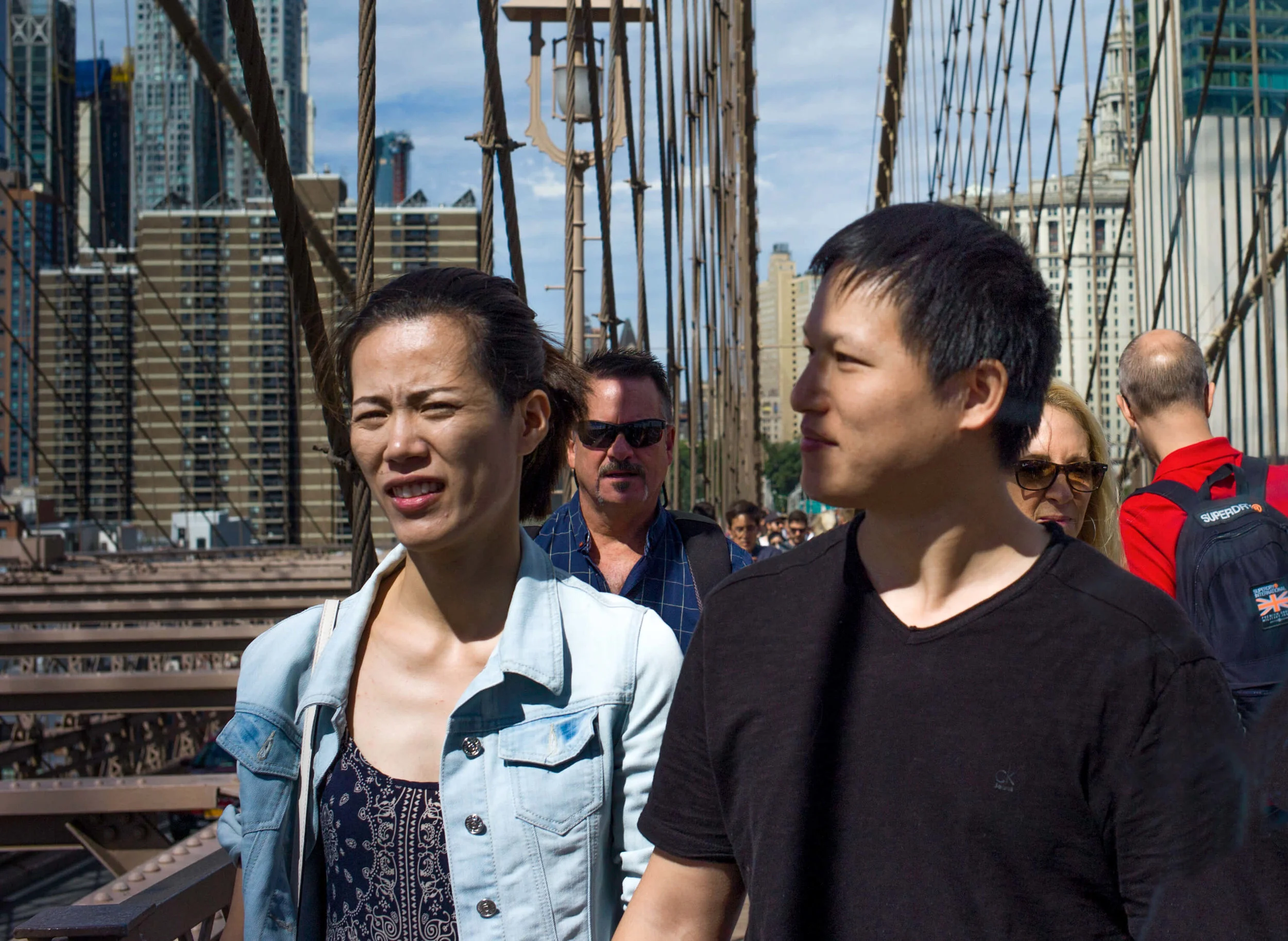 A Pair Of Asian Faces On The Bridge