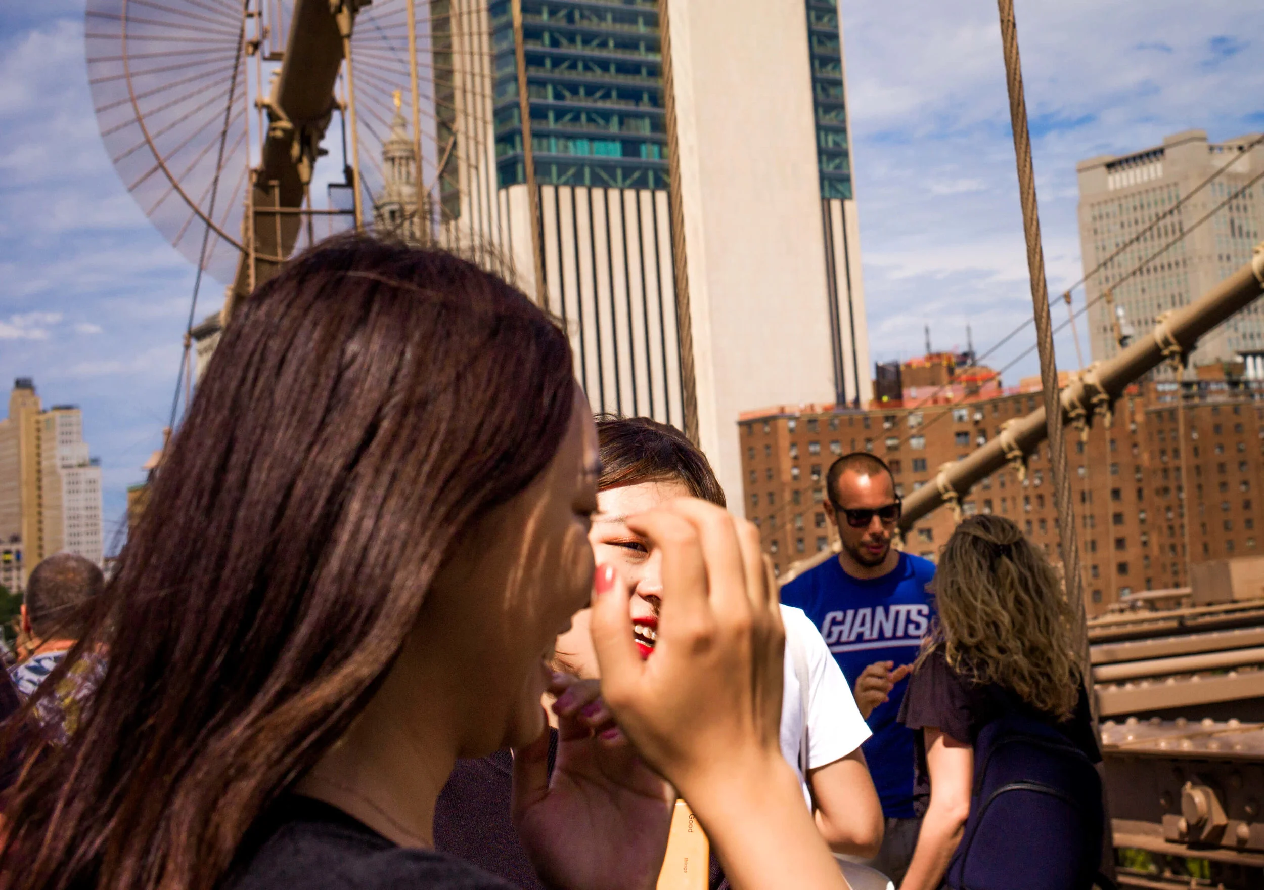 Face In Hand On The Brooklyn Bridge
