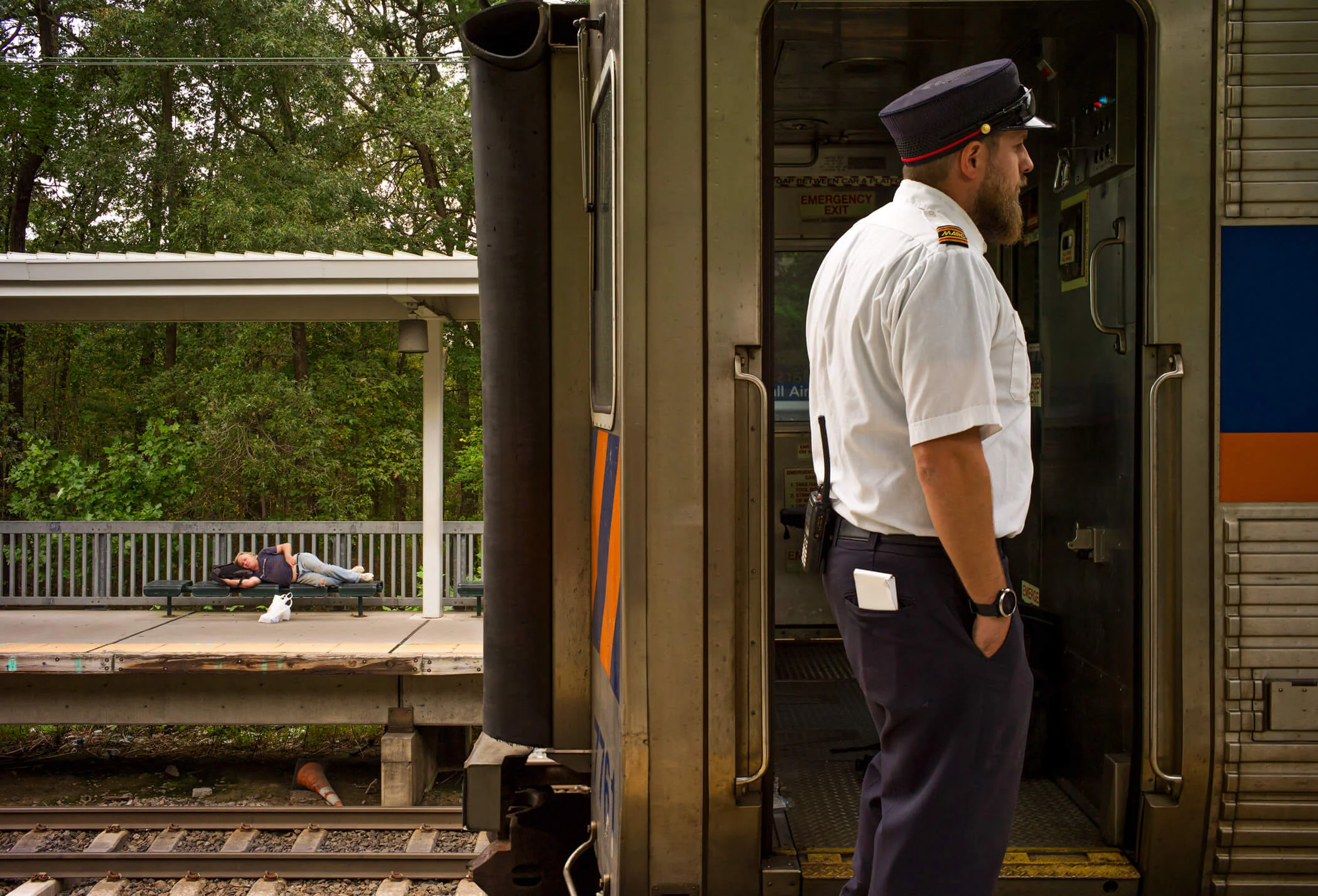 On The Train To NY From MD, A Conductor And A Passenger Wait