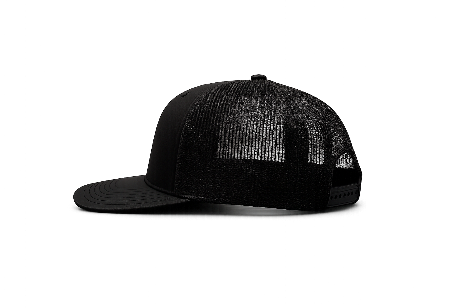Black trucker cap on white backdrop.png