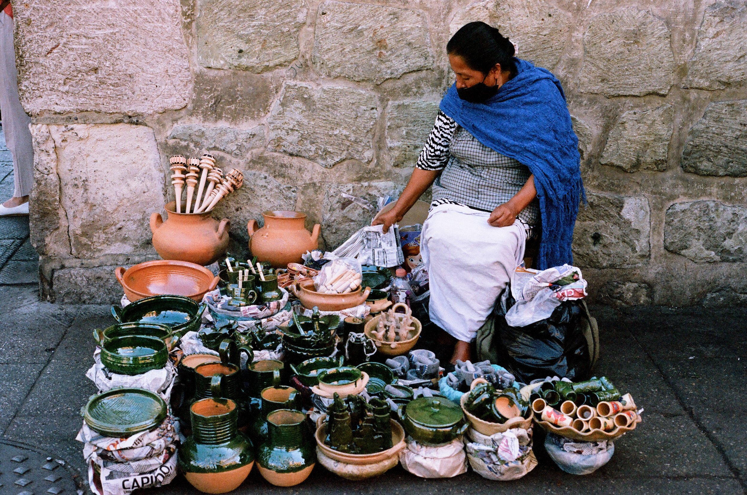 Woman-Selling-Pottery.jpg