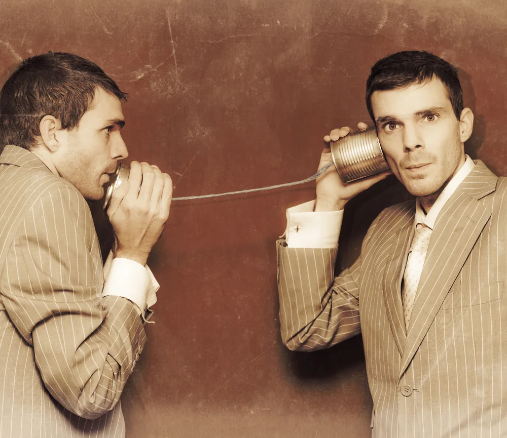 man talking to man with can-2.jpg