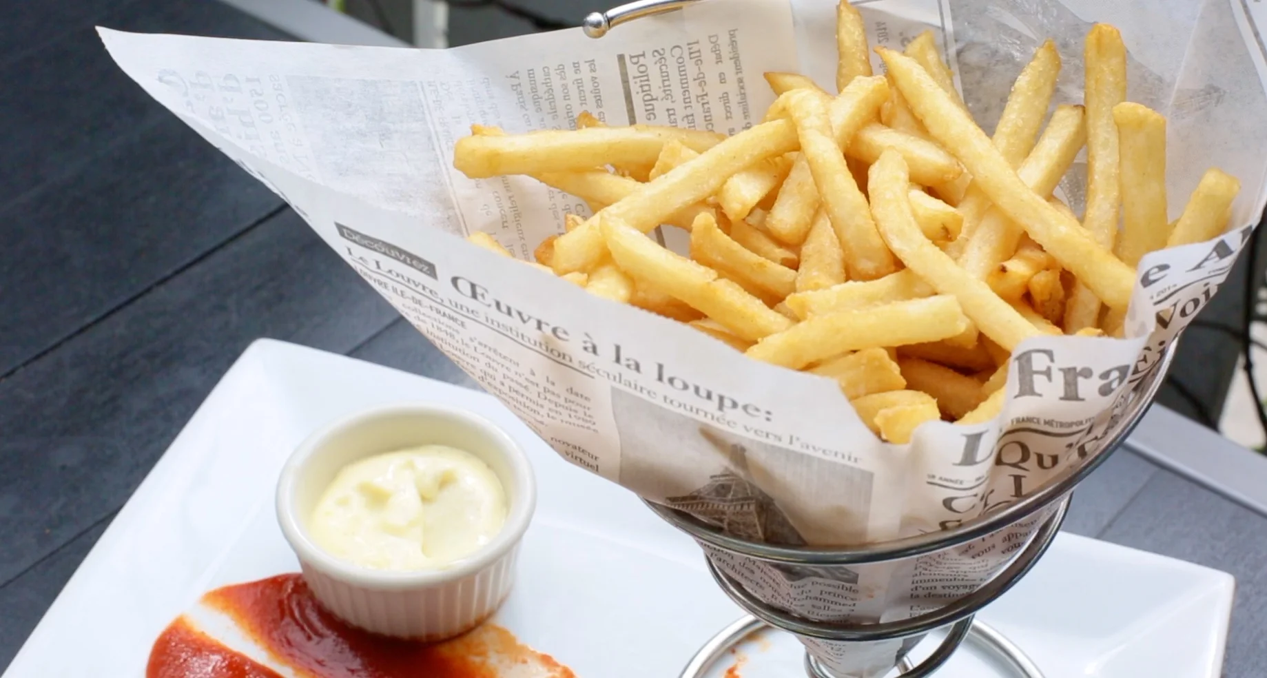 Order French Fries to share at Nine One Five or Point 5, upstairs
