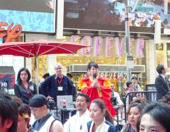 Hosting and translating alongside the head of the organization