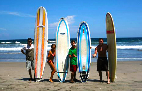 Surf-4 surfers on beach.jpg