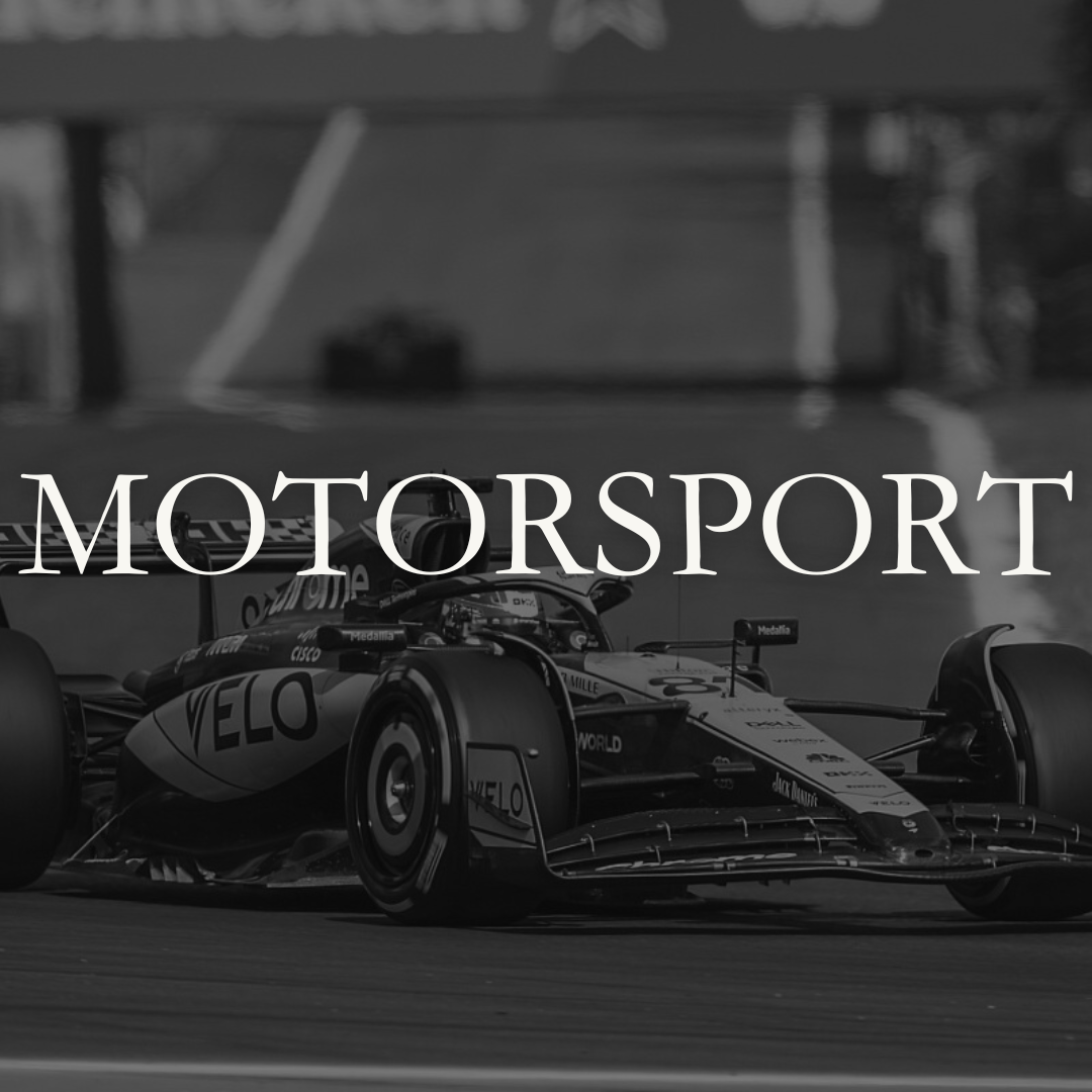 Black and white photo of a Formula 1 race car on a racing track with the word 'MOTORSPORT' overlaid.