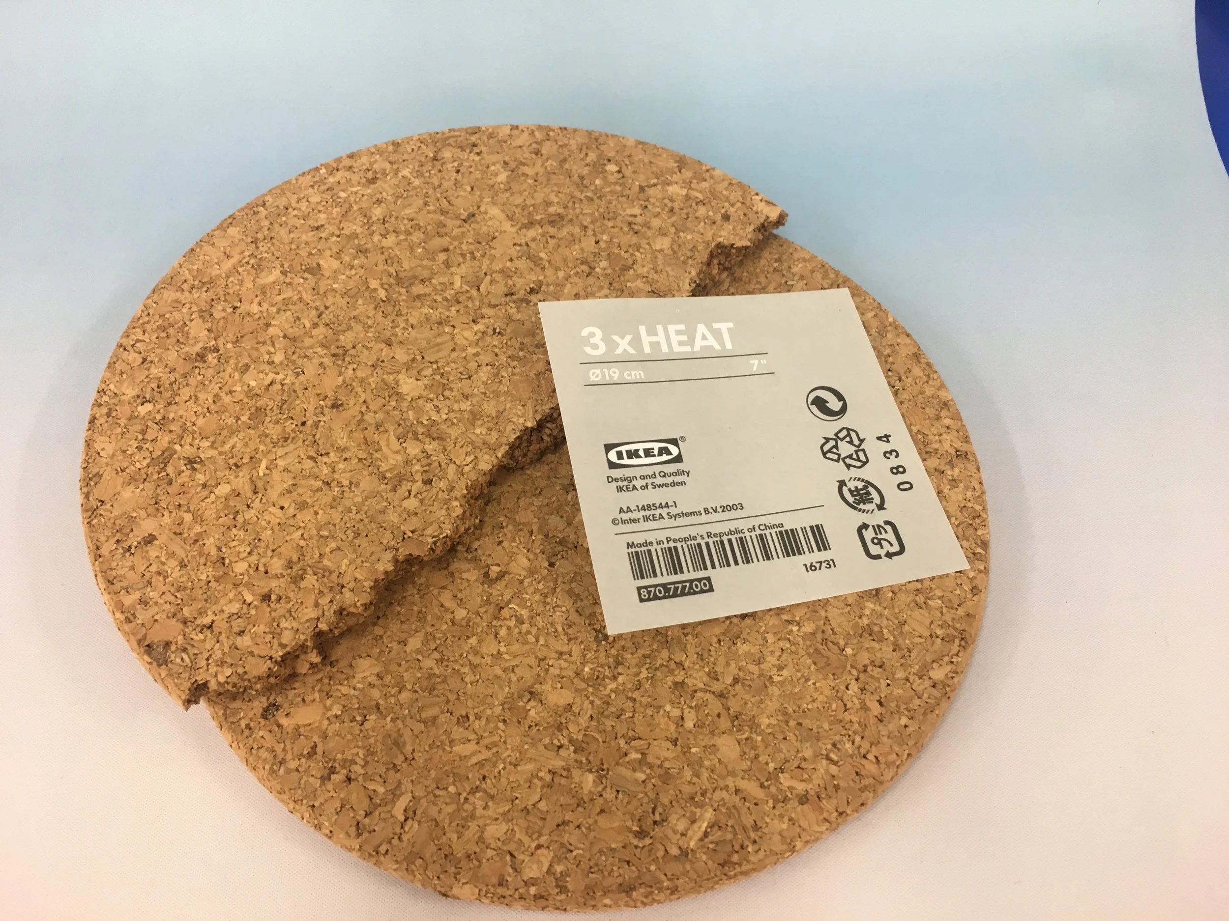 A good cheap source for cork is Ikea. I like using cork that is about a half inch thick. That way you can model high or low.