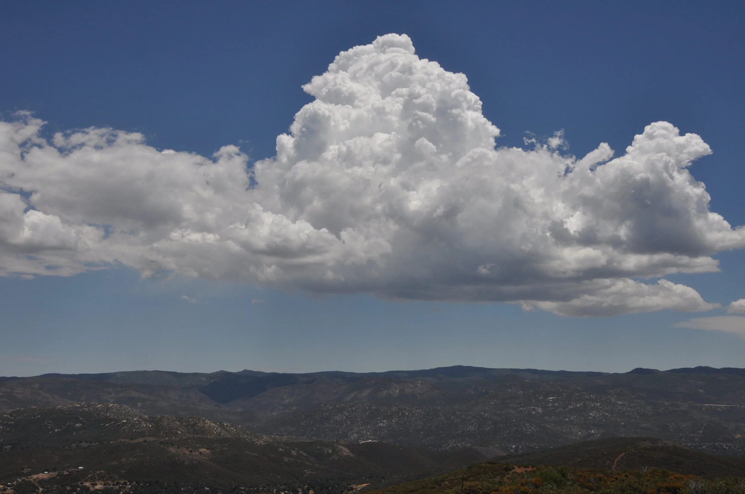 Thunderstorm forming on Mount Laguna to the east