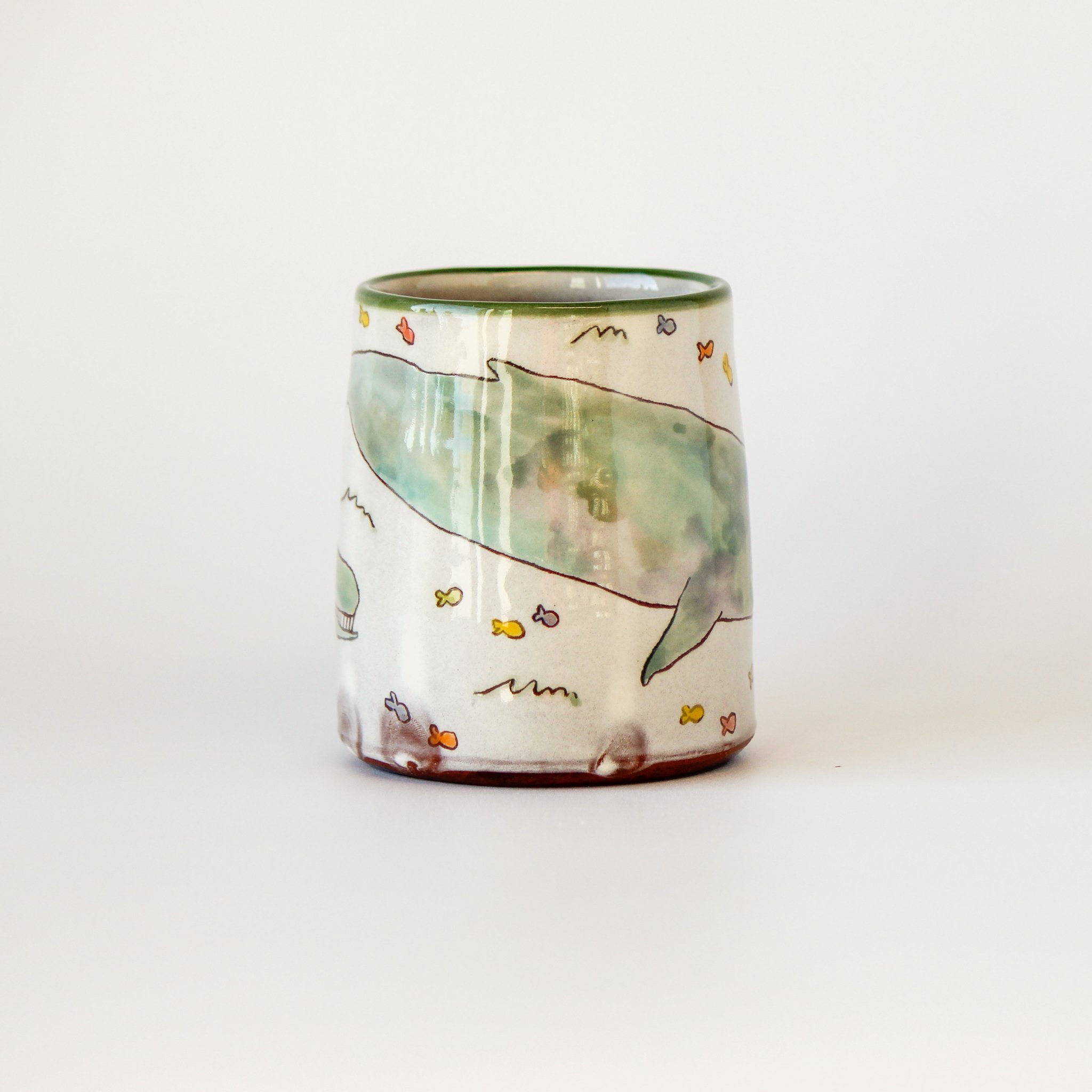 smiley whales mug (dark green rim)