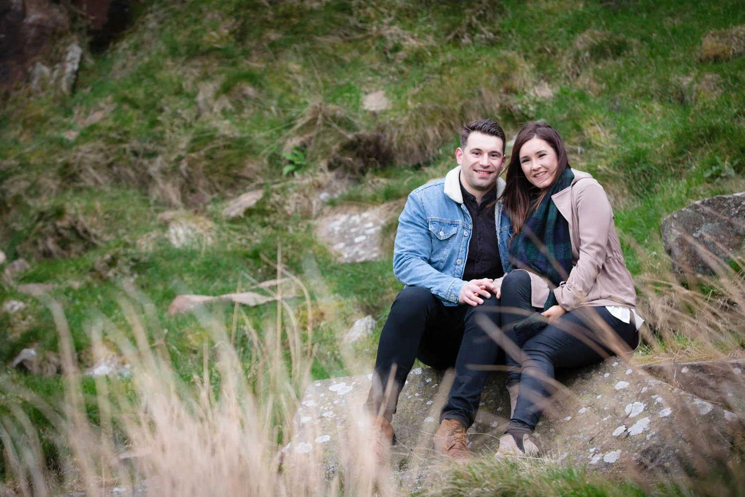 I met up with these two crazy kids at Crow Hill in Marsden (near Huddersfield) for their pre-wedding shoot ahead of their wedding there in June. It was a good opportunity to have a look around the grounds and scout out a few locations for shots on the big day, however for the shoot itself we decided to head up to the moor at the back of the house. I only intended to take them part way up as it was a steep climb to the top, but there was no stopping Andrew as he marched up the hill determined to the get to the rocks at the top (He later announced that he had recently done the Yorkshire 3 peaks challenge in just over 8 hours, which is very impressive and something which I can only dream of doing when I attempt the 3 peaks myself in a couple of weeks!). Anyway, it was certainly worth the effort as we were rewarded with fab views from the top and Andrew had chance to try out his best 'looking into the distance' modelling pose and Claire could work on her 'shampoo ad hair flick' move, courtesy of a brisk wind! I knew that I would have fun working with these guys after I met them at the Rudding Park wedding fair, and I was not wrong. A great couple who are up for a laugh and a lark about and having now seen the stunning venue where they are having their wedding reception, I am even more excited now about shooting their big day in June!