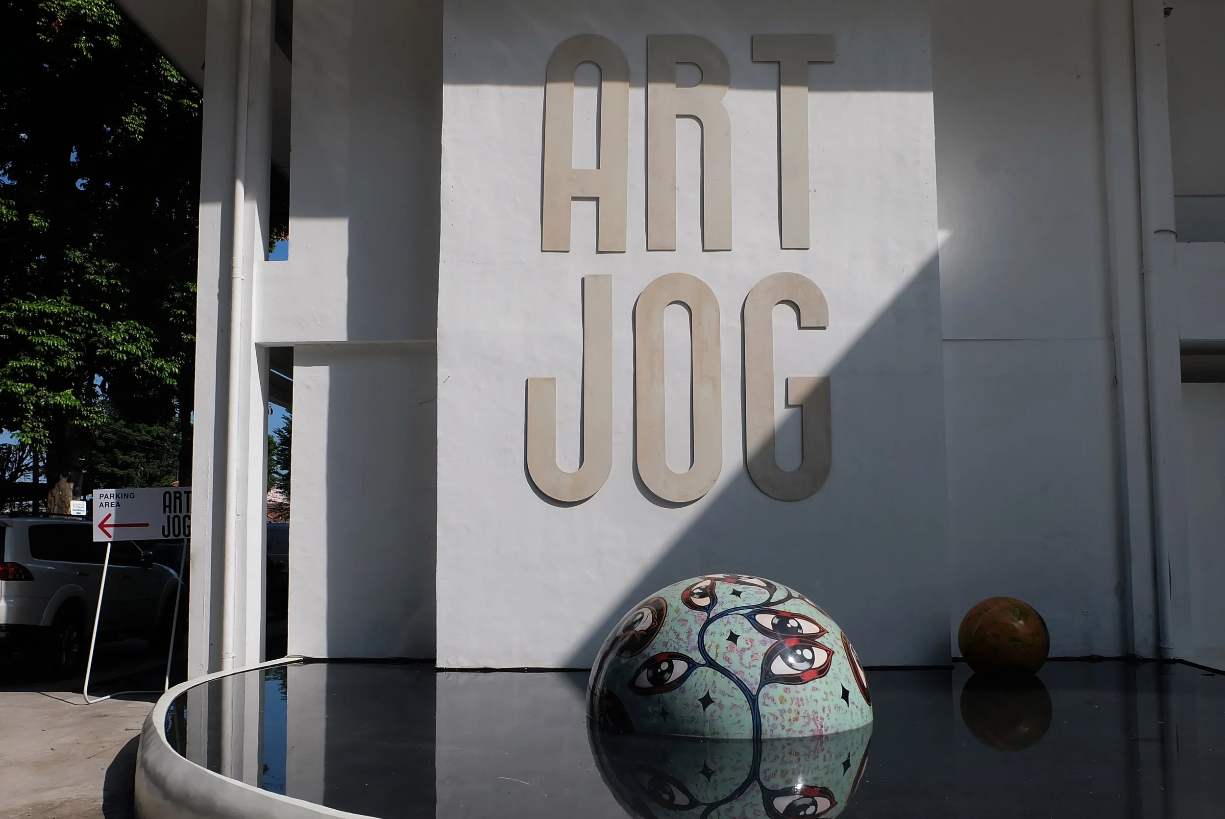 Entrance to ART|JOG; Wedhar Riyadi's "Floating Eyes Series", 2017.