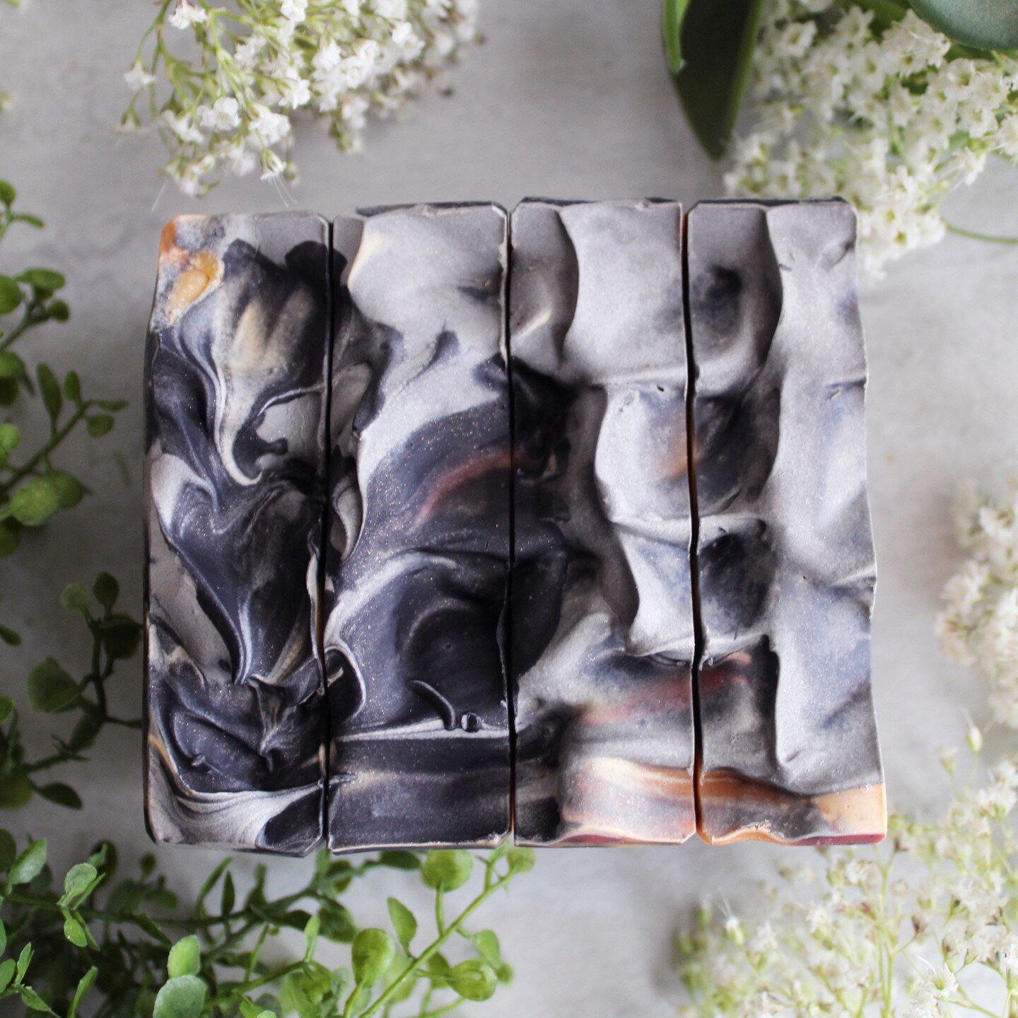 Have you had a chance to try these new Dragon Fire bars? 🔥 These bars launched at the start of the season and have been a hit! They feature fiery swirls of red and orange into a base blackened with activated charcoal. The scent of these bars is a un