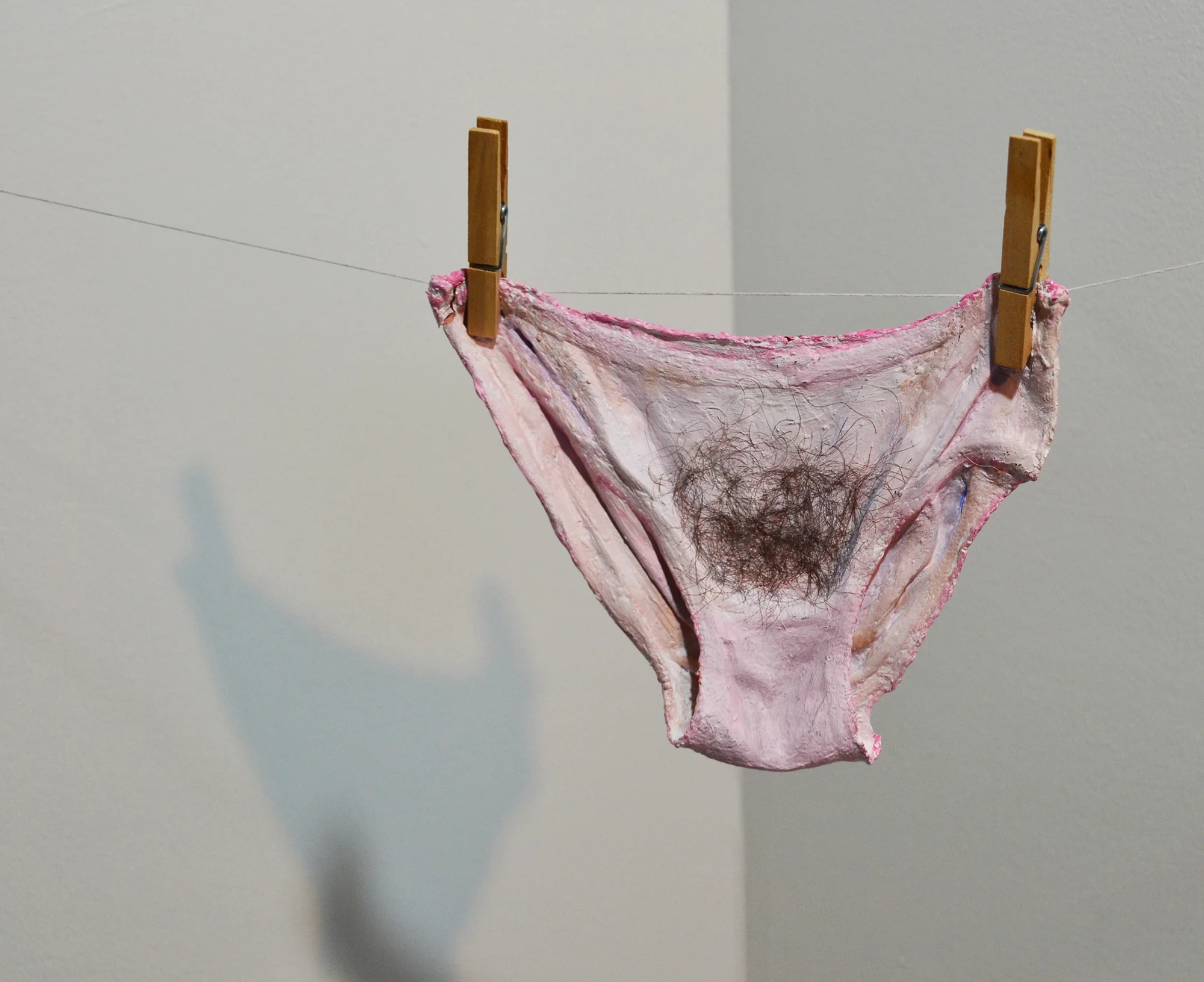  PINK UNDERWEAR  Ceramic underwear,  acrylic paint and hair  2016 