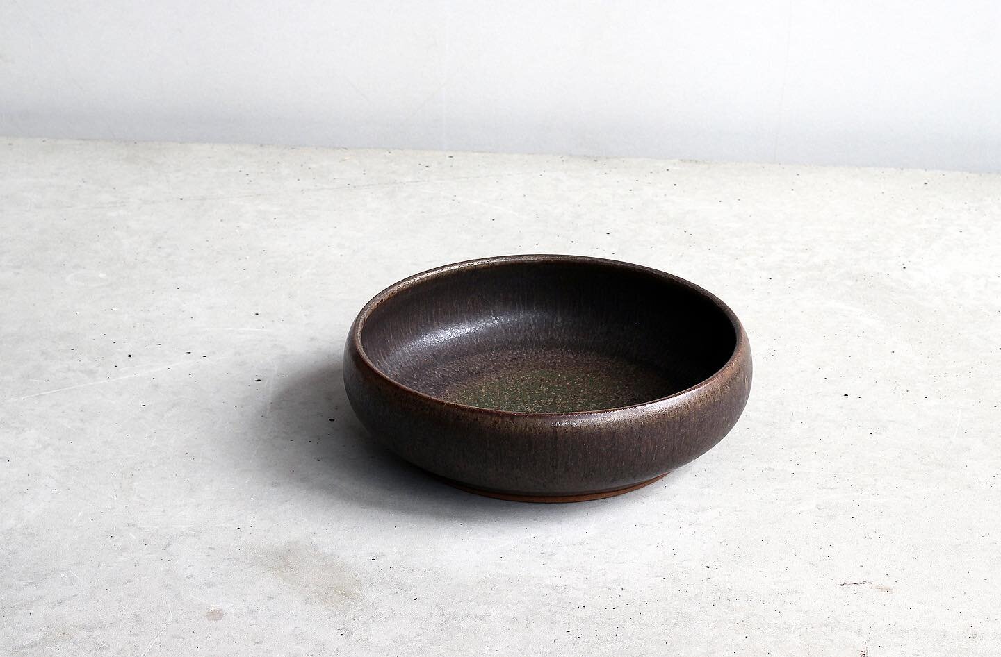 Dark brown low bowl, 17cm.