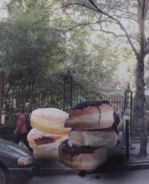 2 and a half boston kreme pie and jelly donut meet at in front of the park which is locate at between 2nd and 3rd ave. between 22nd and 23rd street in manhattan Photomontage.jpg