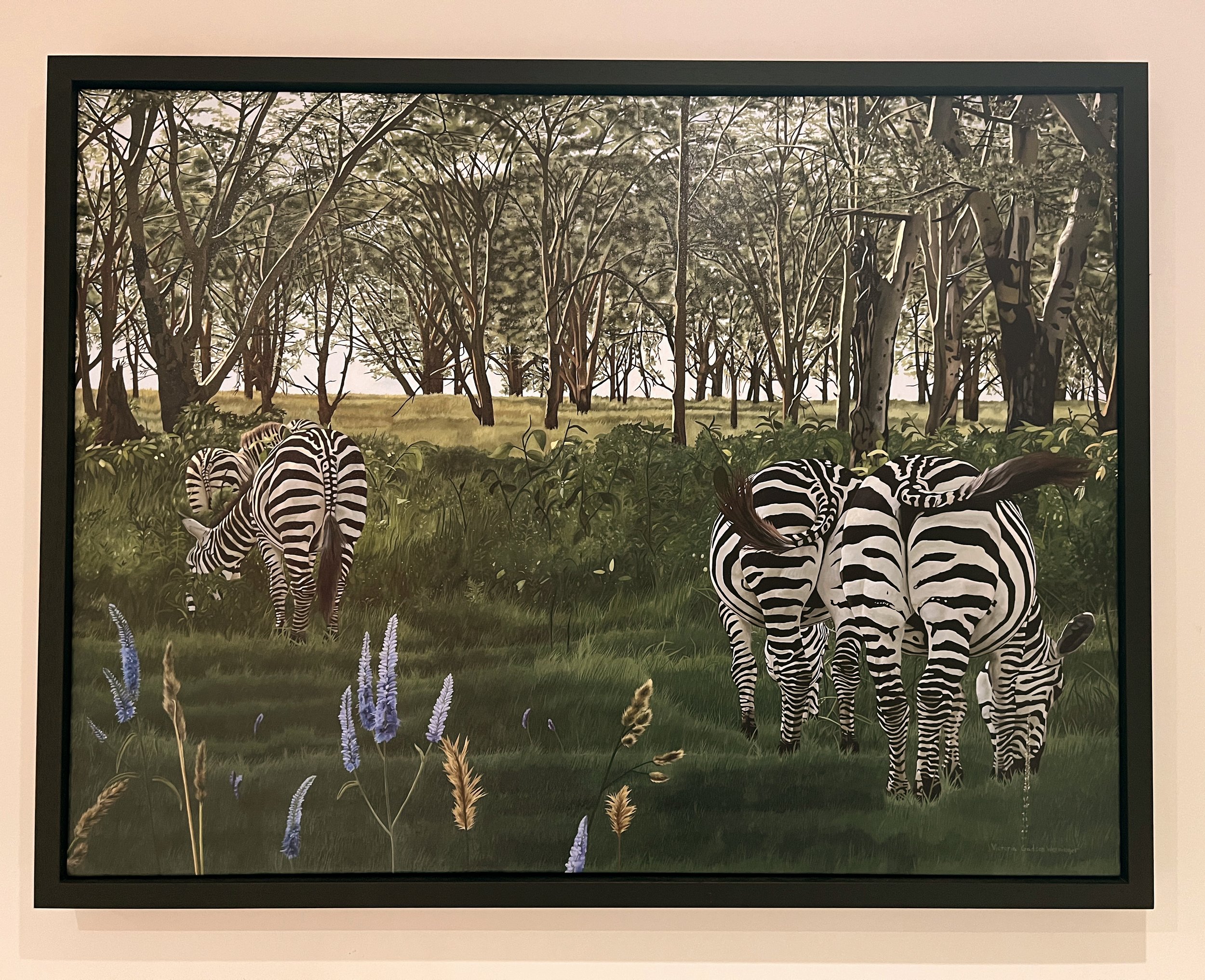 Black Frame. Frame is about 2.5 inches deep. Ready to hang.