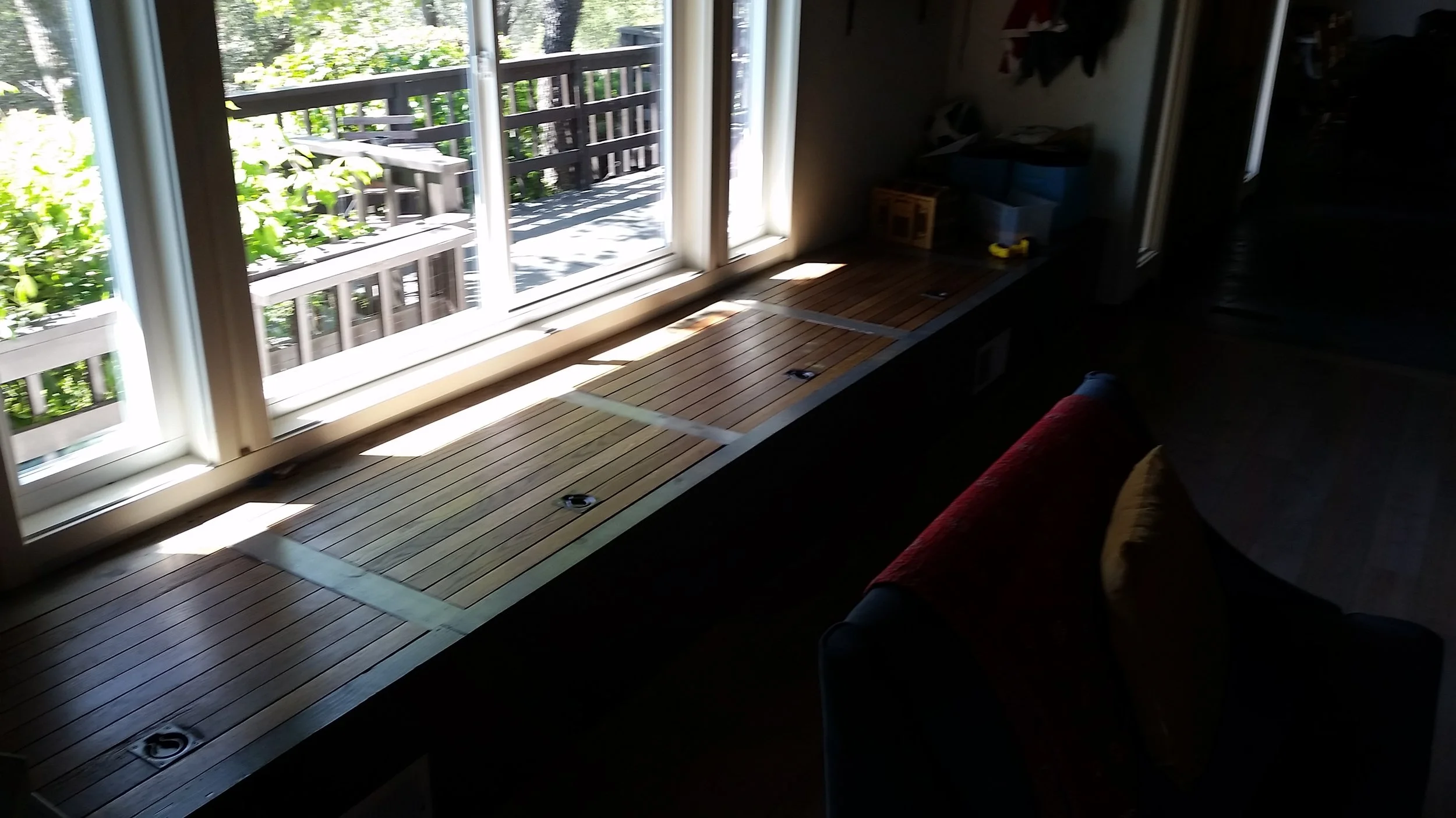Custom window seating and storage built in unit.