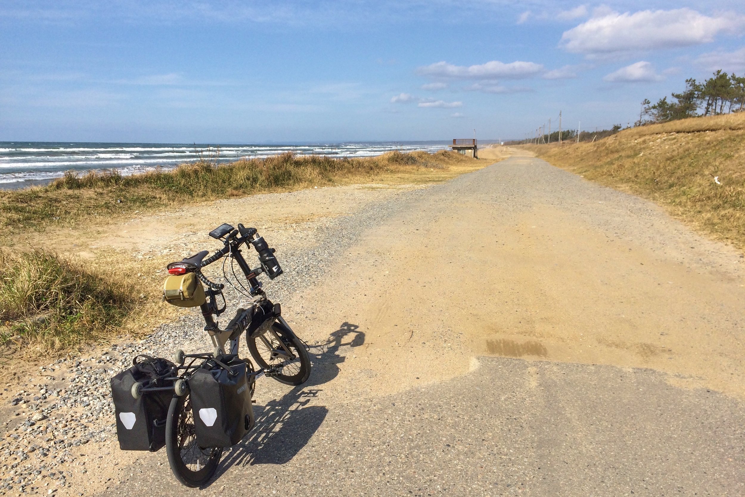 Our starting point at Chirihama with tightly compacted fine sand. It's a challenging ride on skinny tyres.