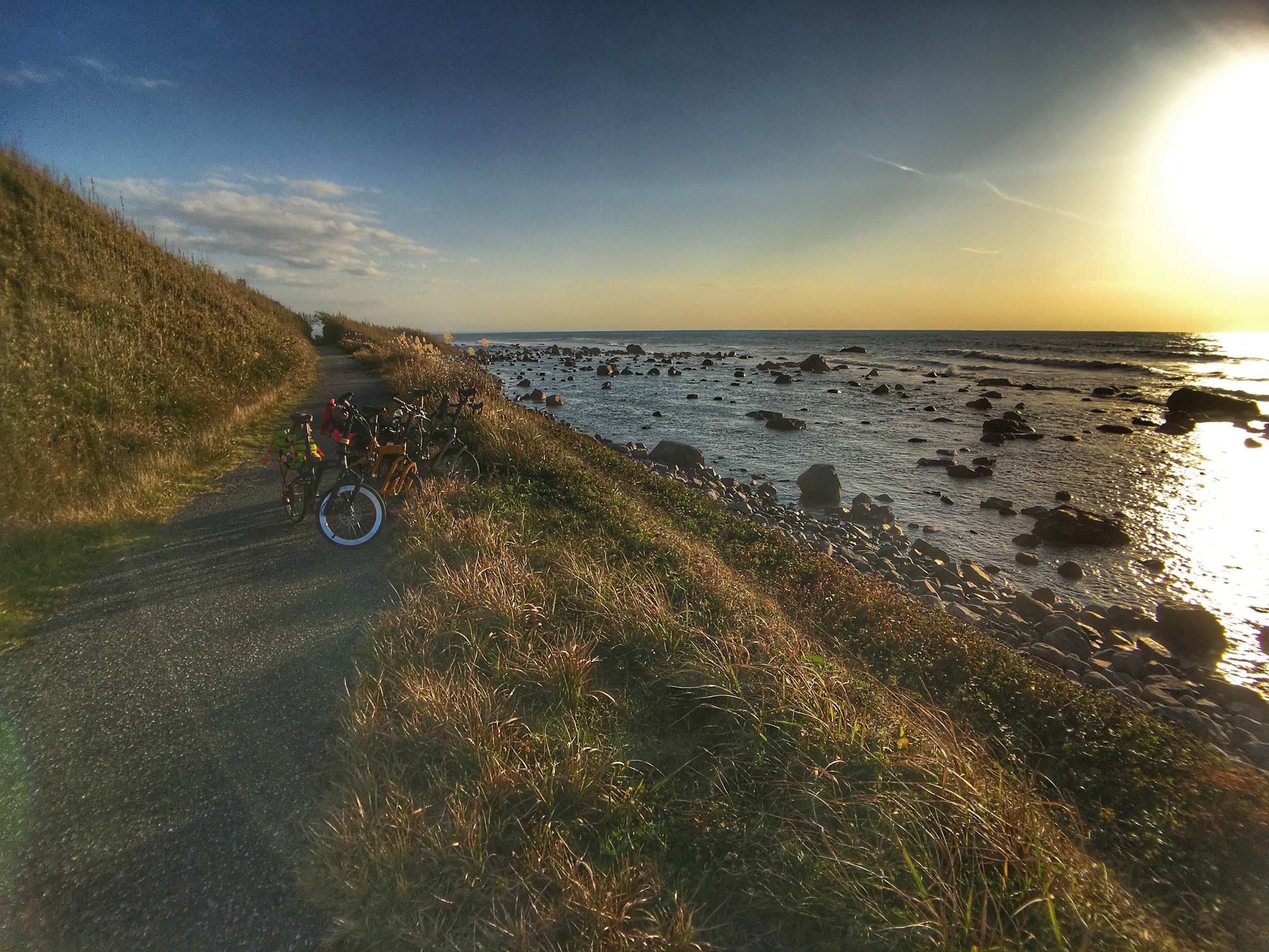 Soaking in the golden hour rays along the beautiful bike path hugging the Shika coastline.