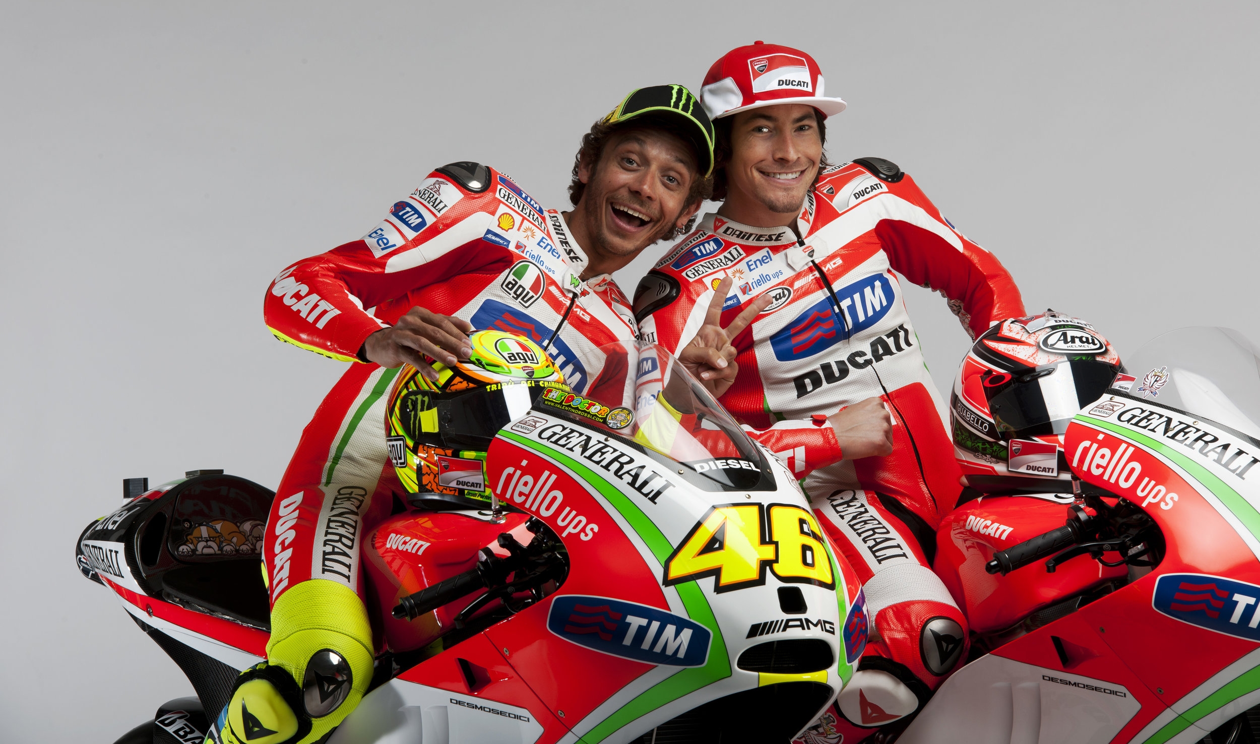 Valentino and Nicky--both safely behatted--at the 2012 Desmosedici unveiling. ( Milagro photo )