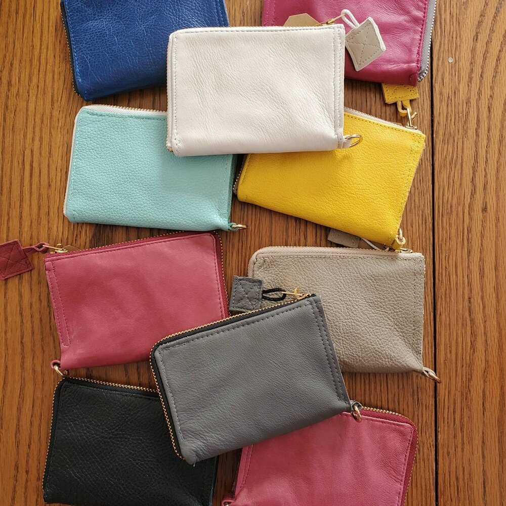 Hold Everything Wallets in leather, with some new colors, are now restocked! Pick up locally at @trimkalamazoo or order online at pennydunham.com.  The #HoldEverythingWallet is a small profile wallet that you can load up with cards, cash and coins. A